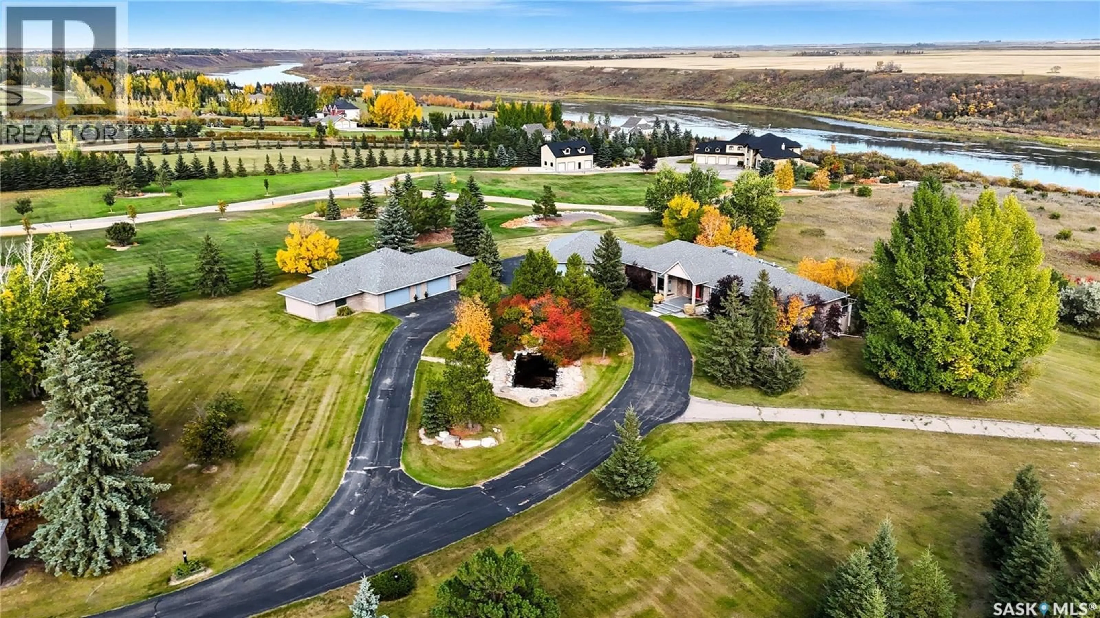 A pic from outside/outdoor area/front of a property/back of a property/a pic from drone, water/lake/river/ocean view for 48 CATHEDRAL BLUFFS ROAD, Corman Park Rm No. 344 Saskatchewan S7P1A3