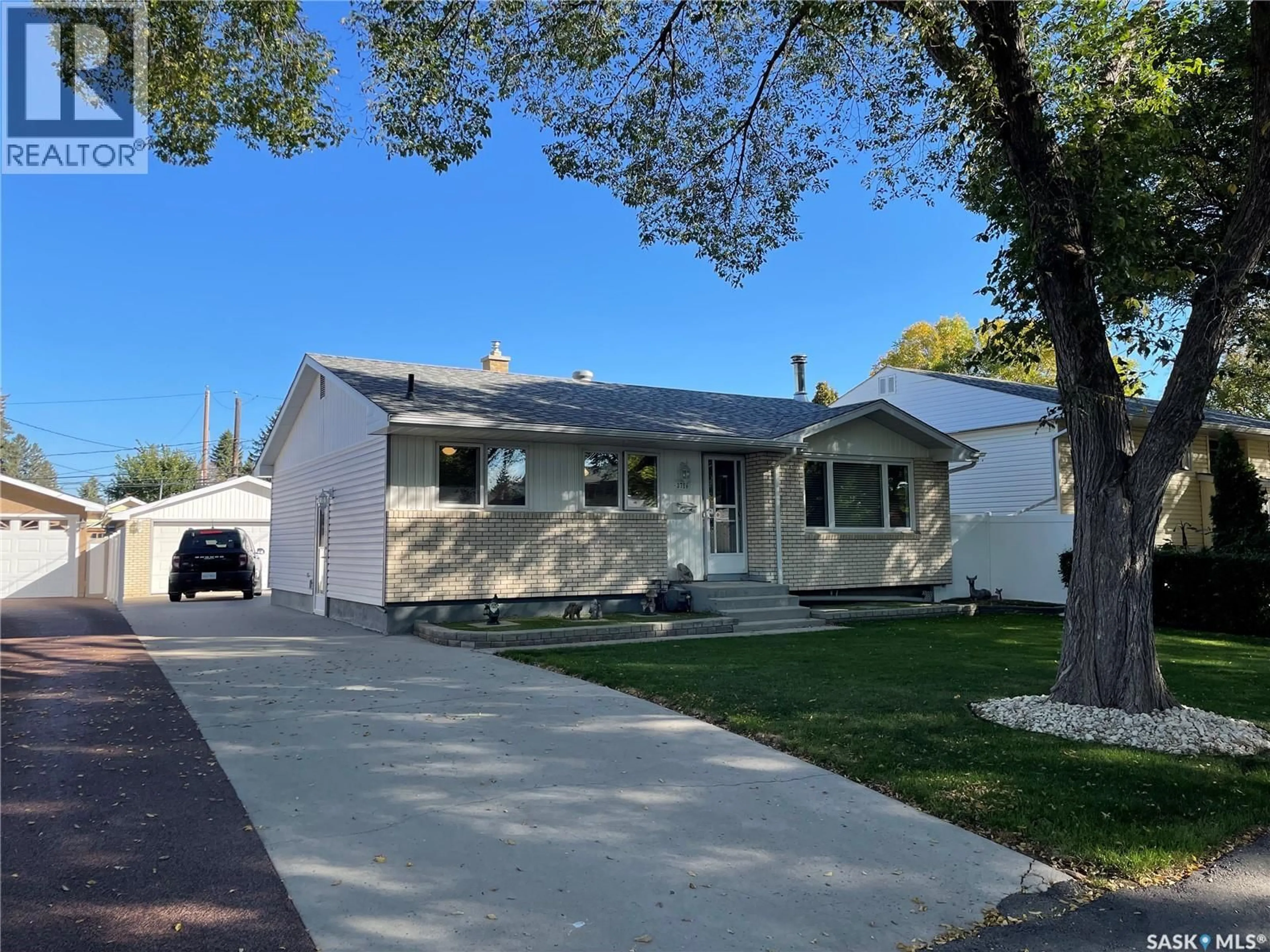 Home with vinyl exterior material, street for 3716 29TH AVENUE, Regina Saskatchewan S4S2P9