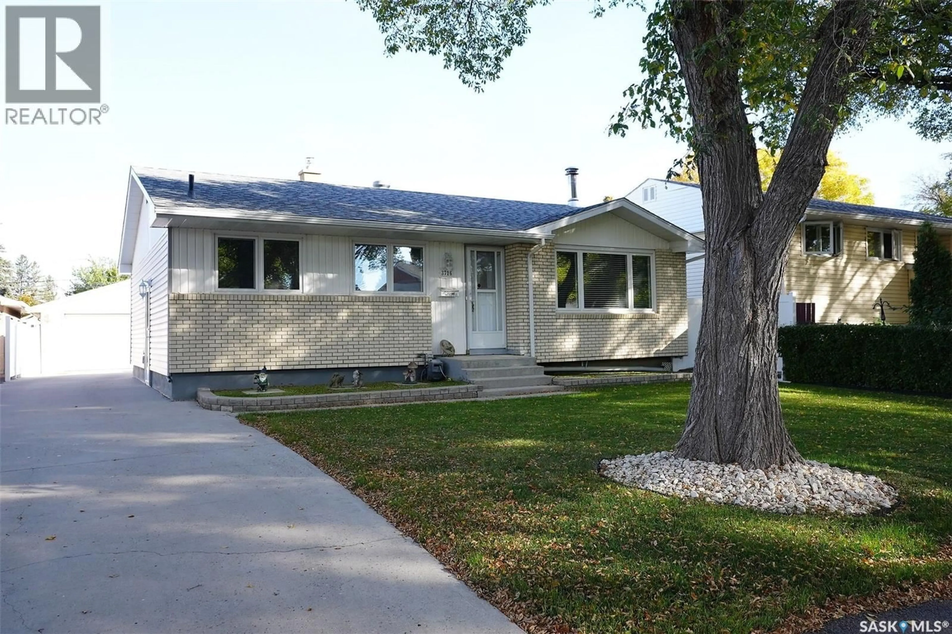 Home with vinyl exterior material, street for 3716 29TH AVENUE, Regina Saskatchewan S4S2P9