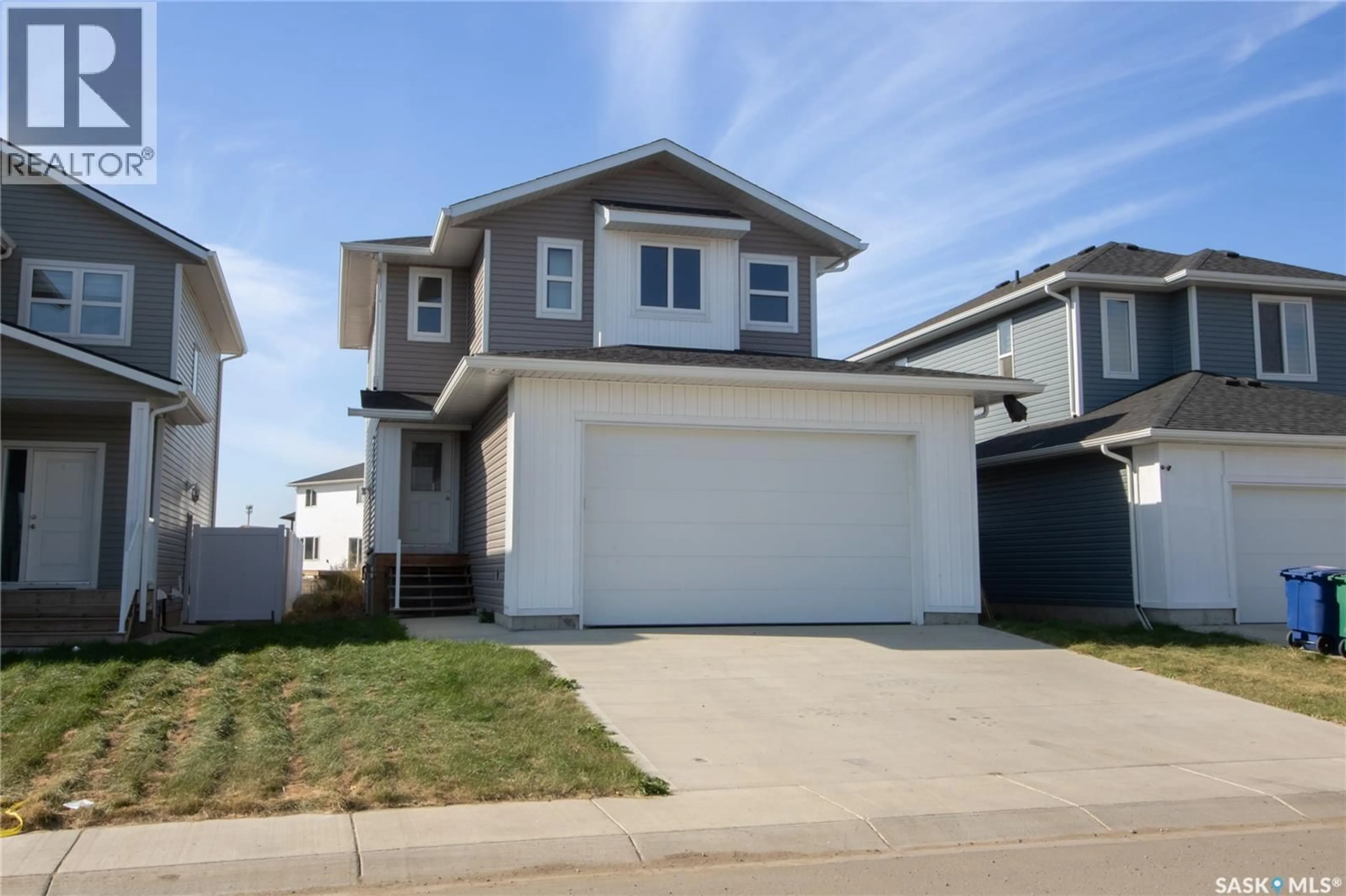 Home with vinyl exterior material, street for 111 STROMBERG CRESCENT, Saskatoon Saskatchewan S7L7C4