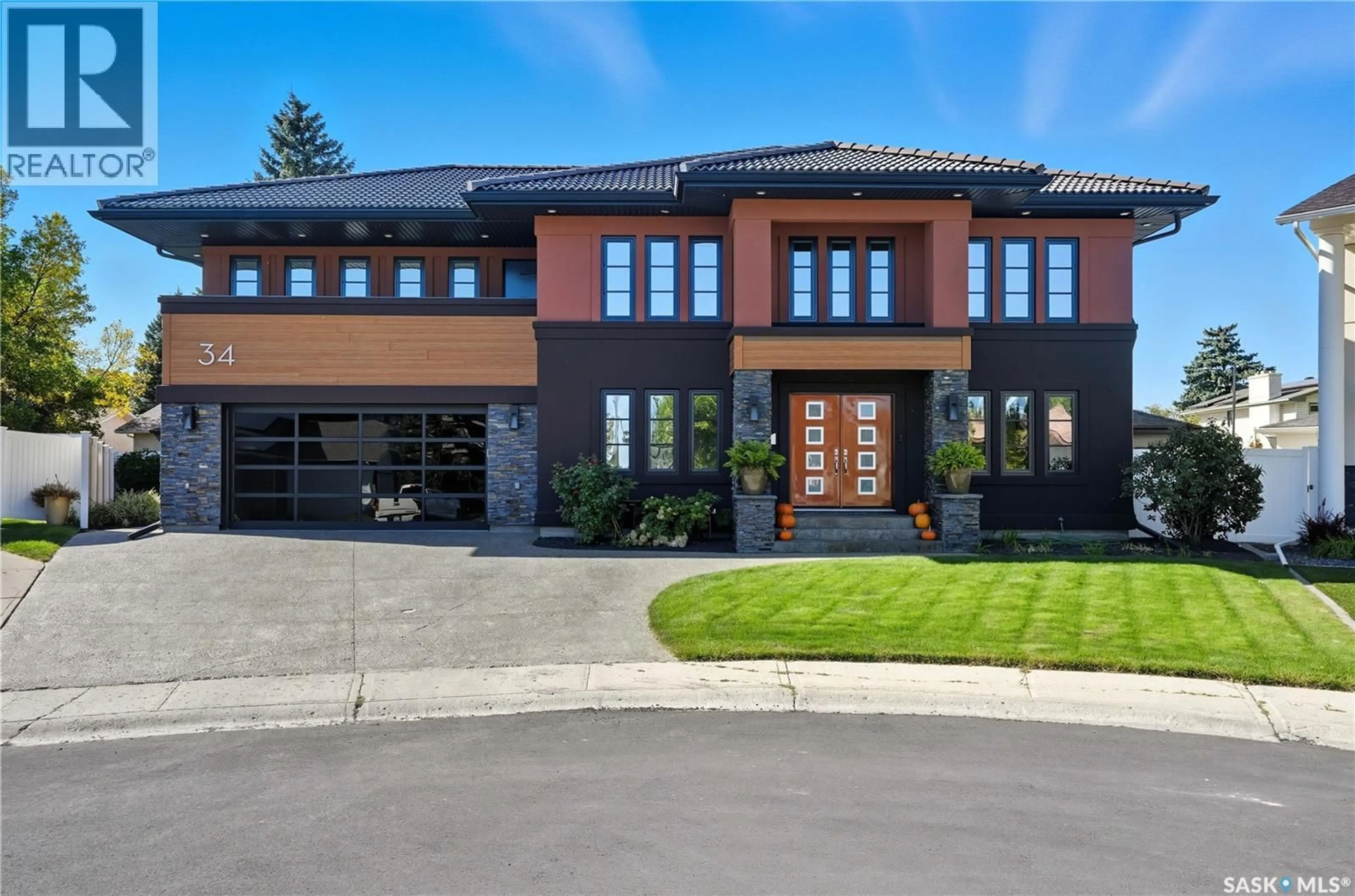 Home with brick exterior material, street for 34 LESLIE PLACE, Regina Saskatchewan S4S6R2