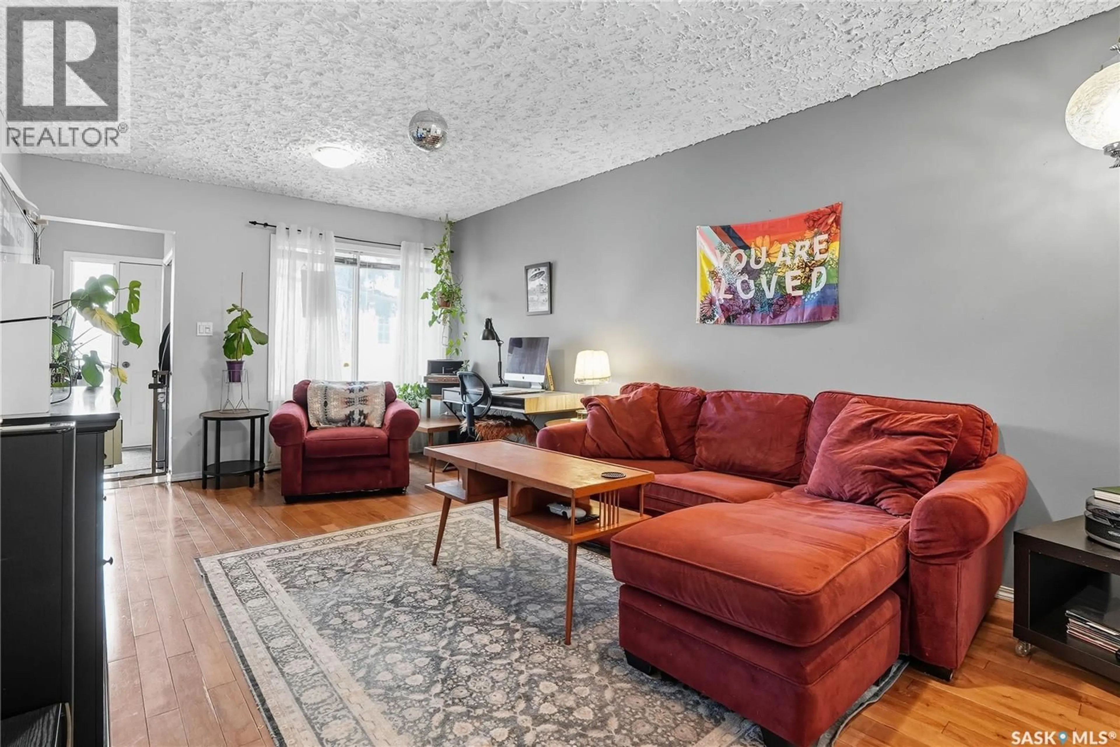 Living room with furniture, unknown for 1017 I AVENUE, Saskatoon Saskatchewan S7M1Z6