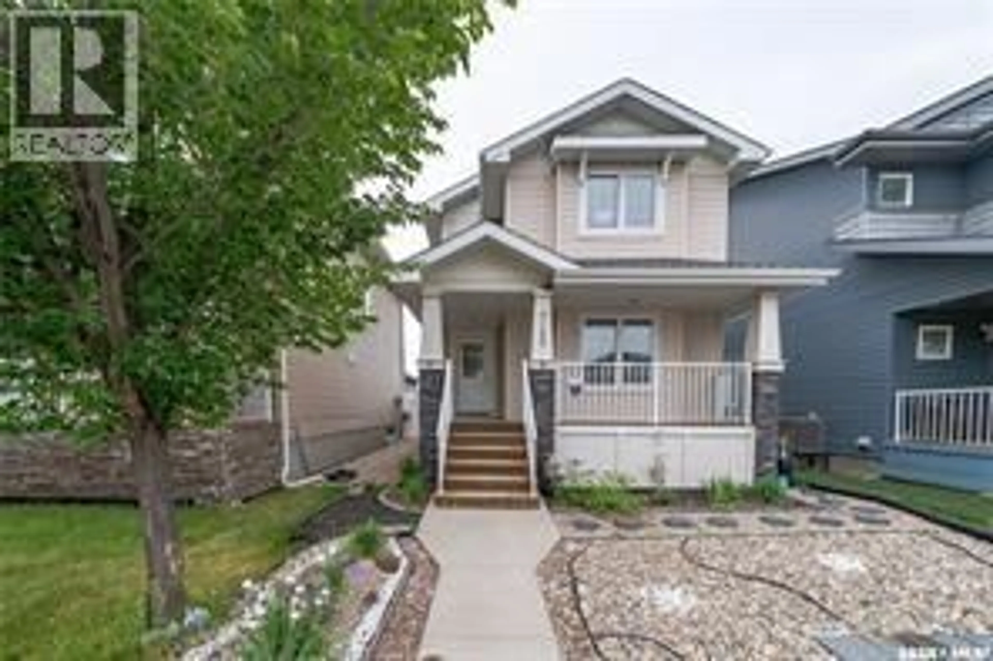 Home with vinyl exterior material, street for 5128 AERIAL CRESCENT, Regina Saskatchewan S4W0C8