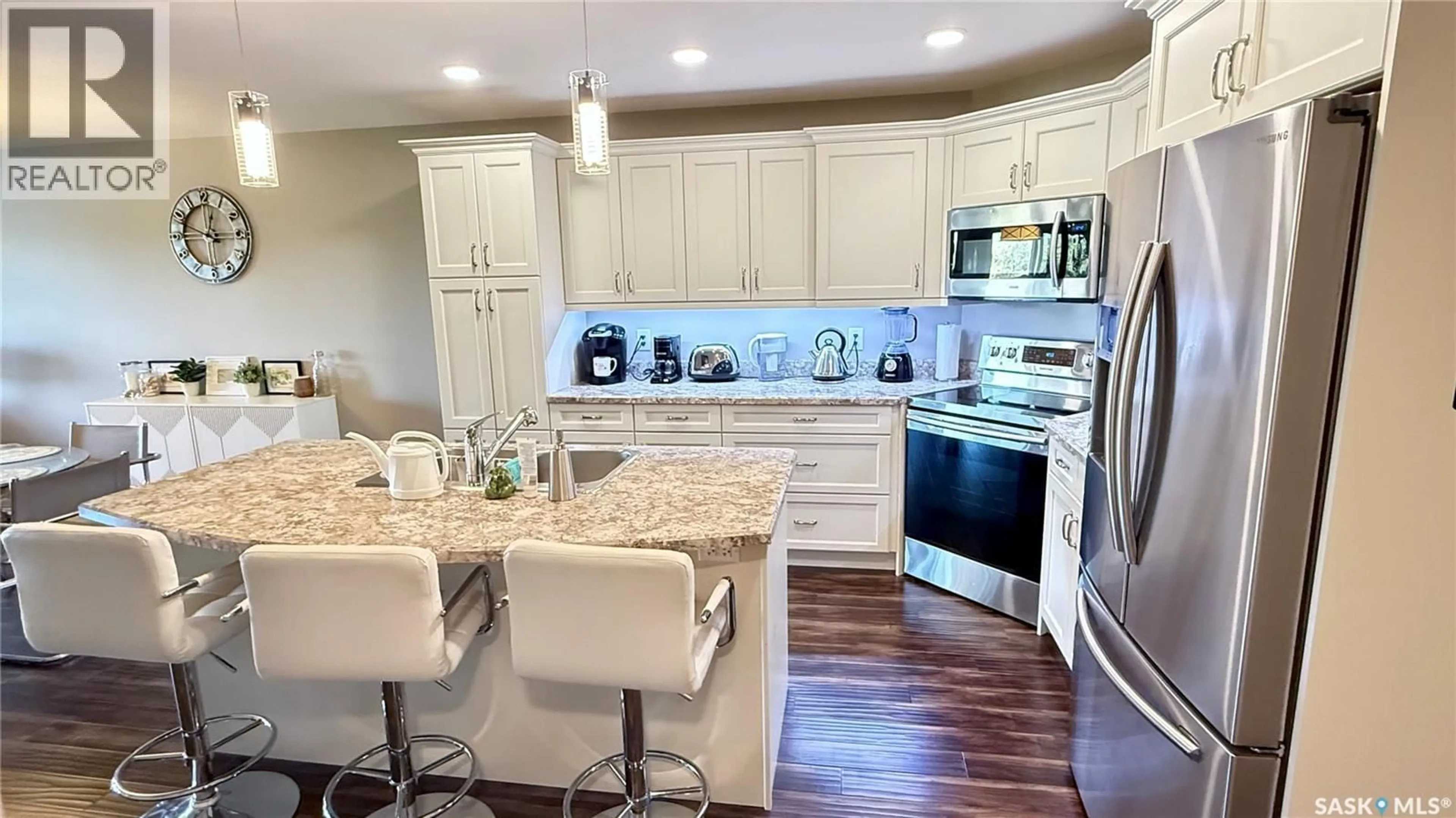 Open concept kitchen, ceramic/tile floor for 202 1600 1ST STREET E, Prince Albert Saskatchewan S6V1G7