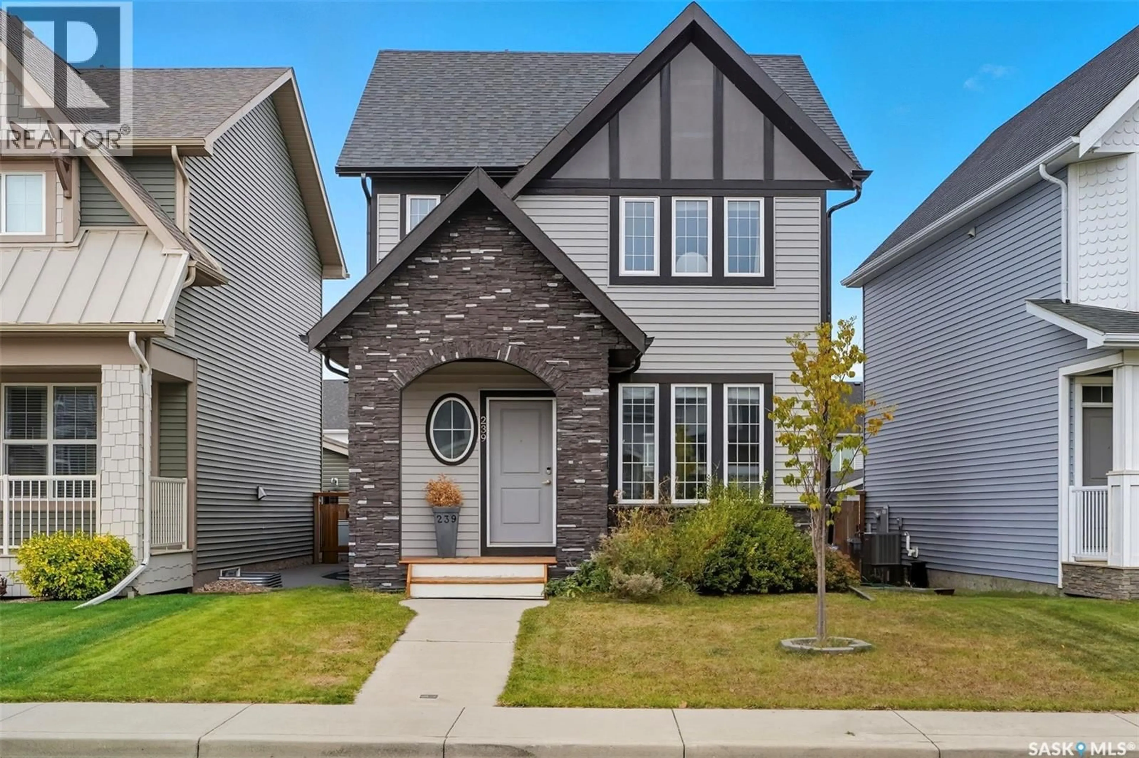 Home with brick exterior material, street for 239 NEWTON LINK, Saskatoon Saskatchewan S7V0N6