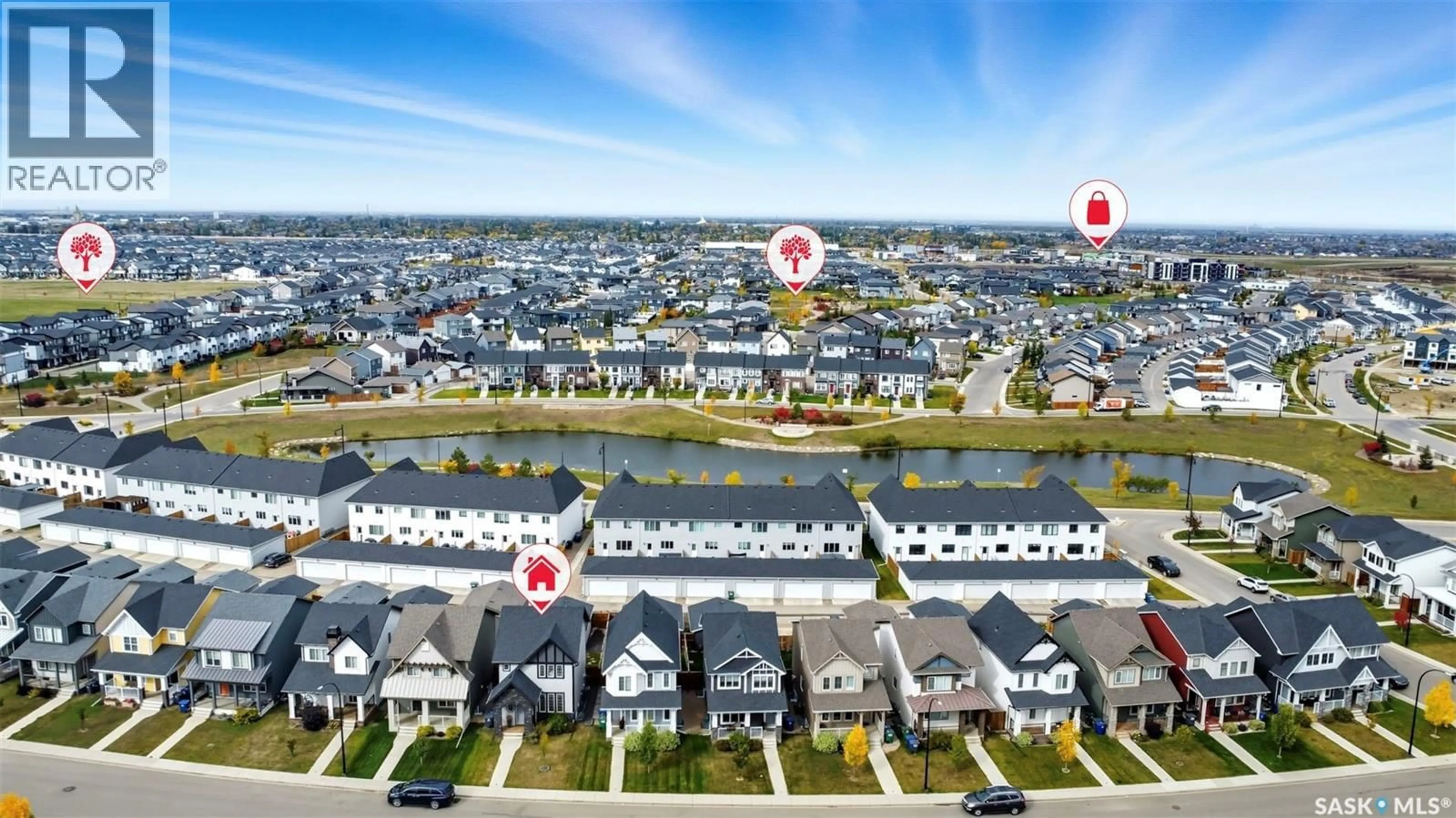 A pic from outside/outdoor area/front of a property/back of a property/a pic from drone, water/lake/river/ocean view for 239 NEWTON LINK, Saskatoon Saskatchewan S7V0N6