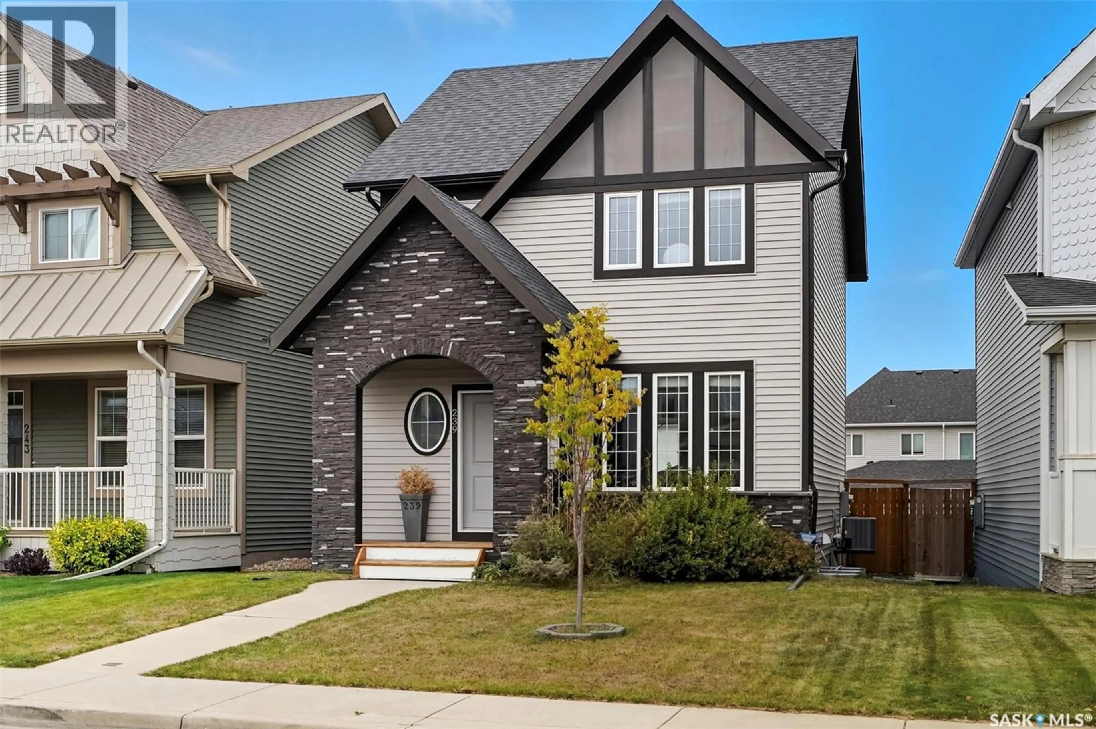 Home with brick exterior material, street for 239 NEWTON LINK, Saskatoon Saskatchewan S7V0N6
