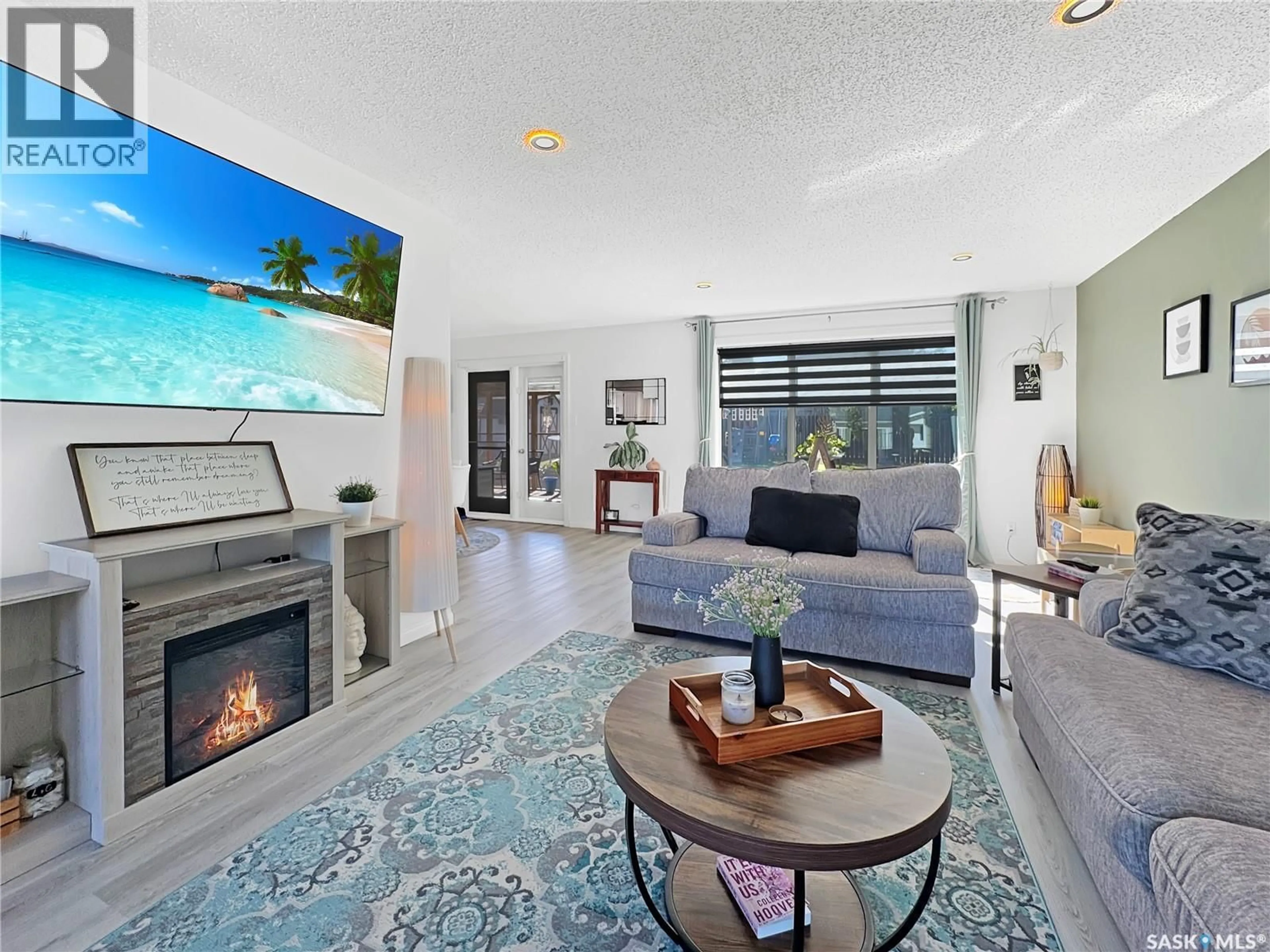 Living room with furniture, ceramic/tile floor for 241 RIVERBEND CRESCENT, Battleford Saskatchewan S0M0E0