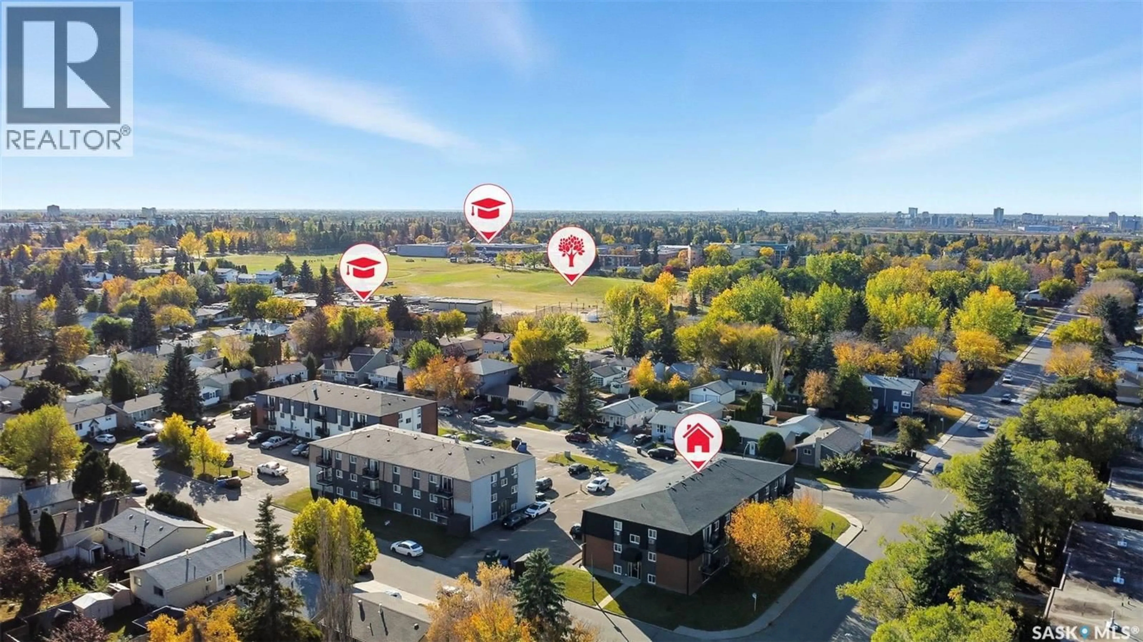 A pic from outside/outdoor area/front of a property/back of a property/a pic from drone, unknown for 9 115 ACADIA DRIVE, Saskatoon Saskatchewan S7H4T8
