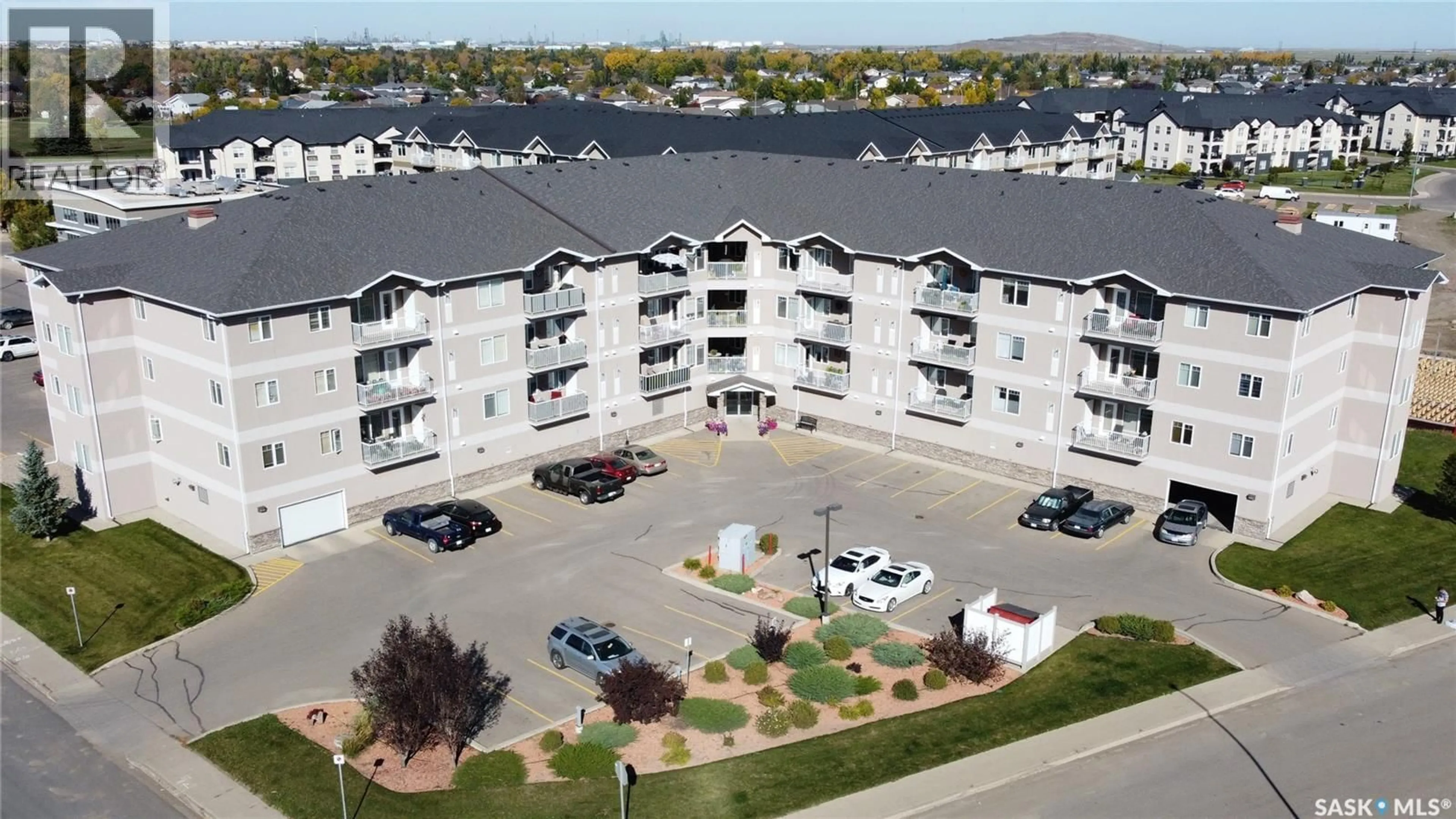 A pic from outside/outdoor area/front of a property/back of a property/a pic from drone, water/lake/river/ocean view for 108 - 3730 EASTGATE DRIVE, Regina Saskatchewan S4Z0A1