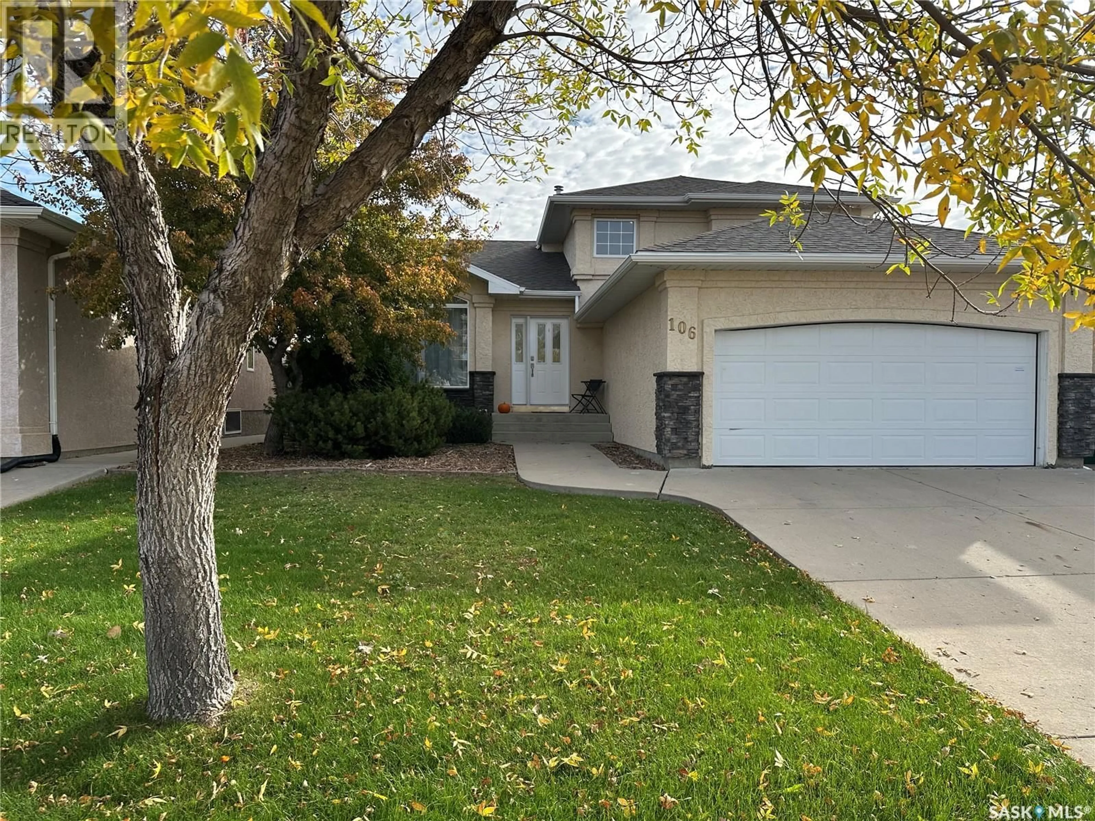 Home with vinyl exterior material, street for 106 BROOKMORE CRESCENT, Saskatoon Saskatchewan S7V1C1