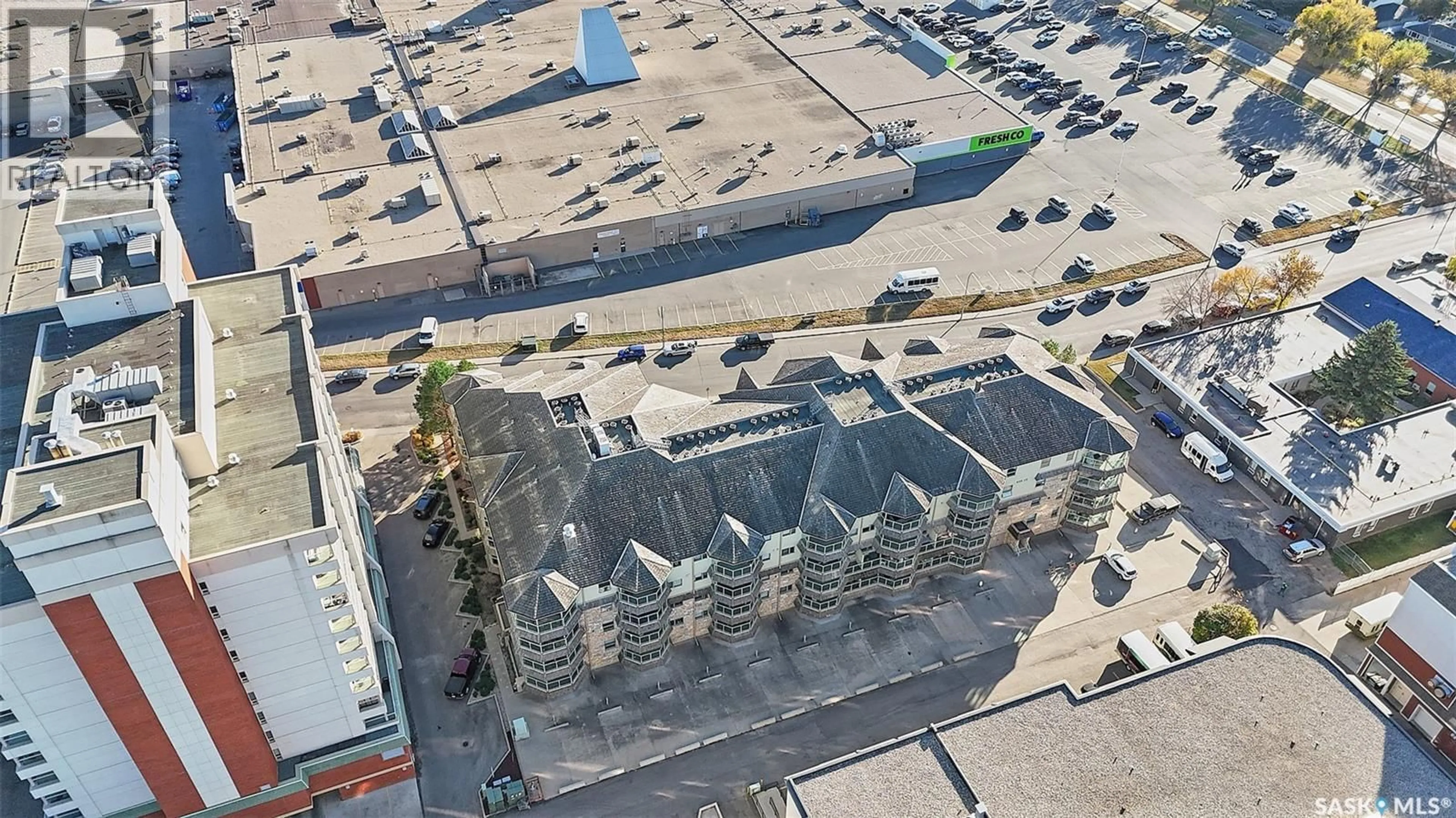 A pic from outside/outdoor area/front of a property/back of a property/a pic from drone, unknown for 412 2213 ADELAIDE STREET E, Saskatoon Saskatchewan S7J0J6