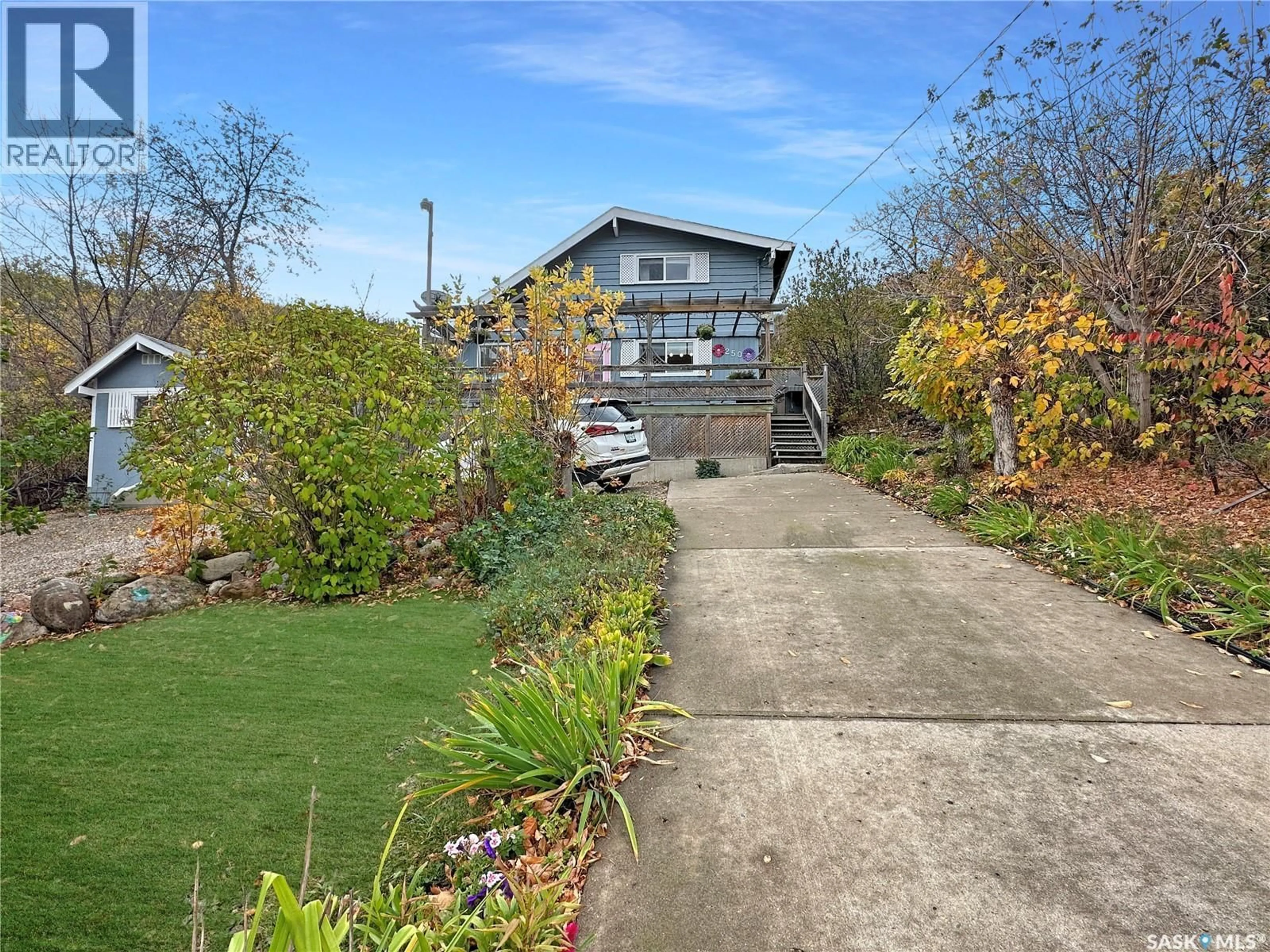 A pic from outside/outdoor area/front of a property/back of a property/a pic from drone, street for 250 B-SAY-TAH ROAD, B-Say-Tah Saskatchewan S0G1S0