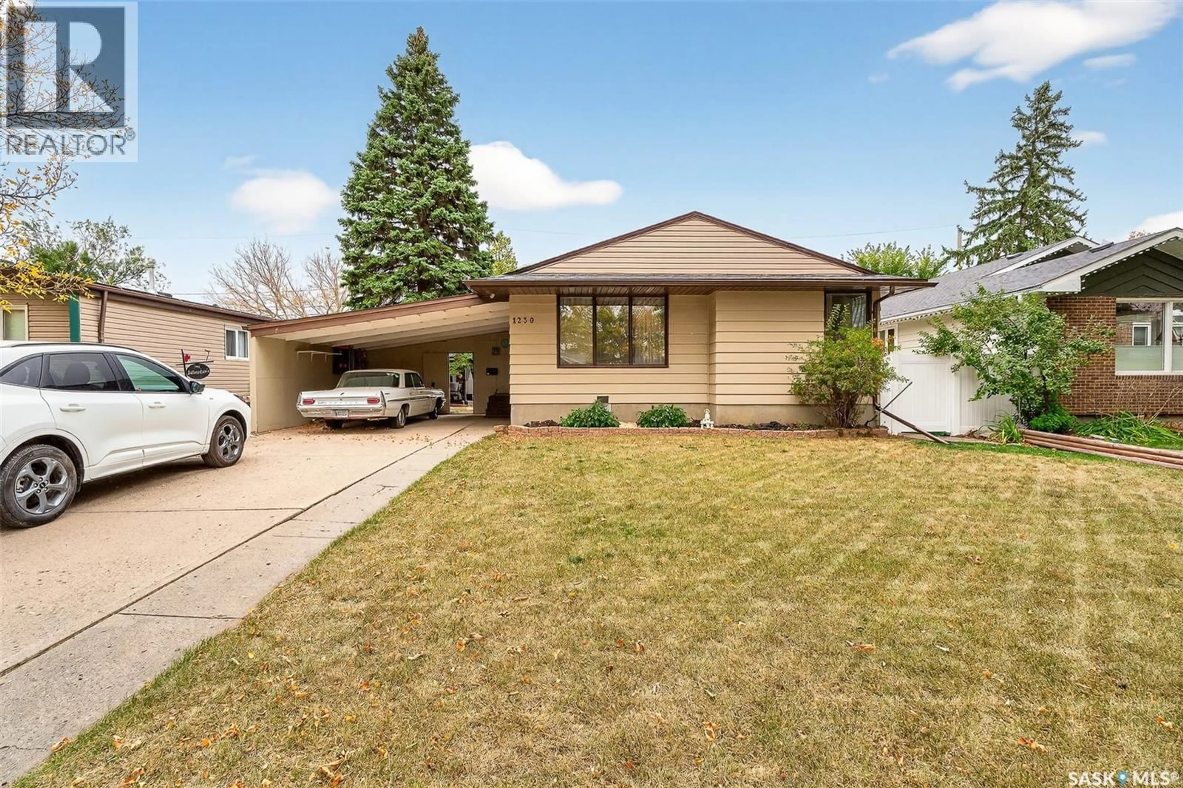 Home with vinyl exterior material, street for 1230 GRACE STREET, Moose Jaw Saskatchewan S6H3C7