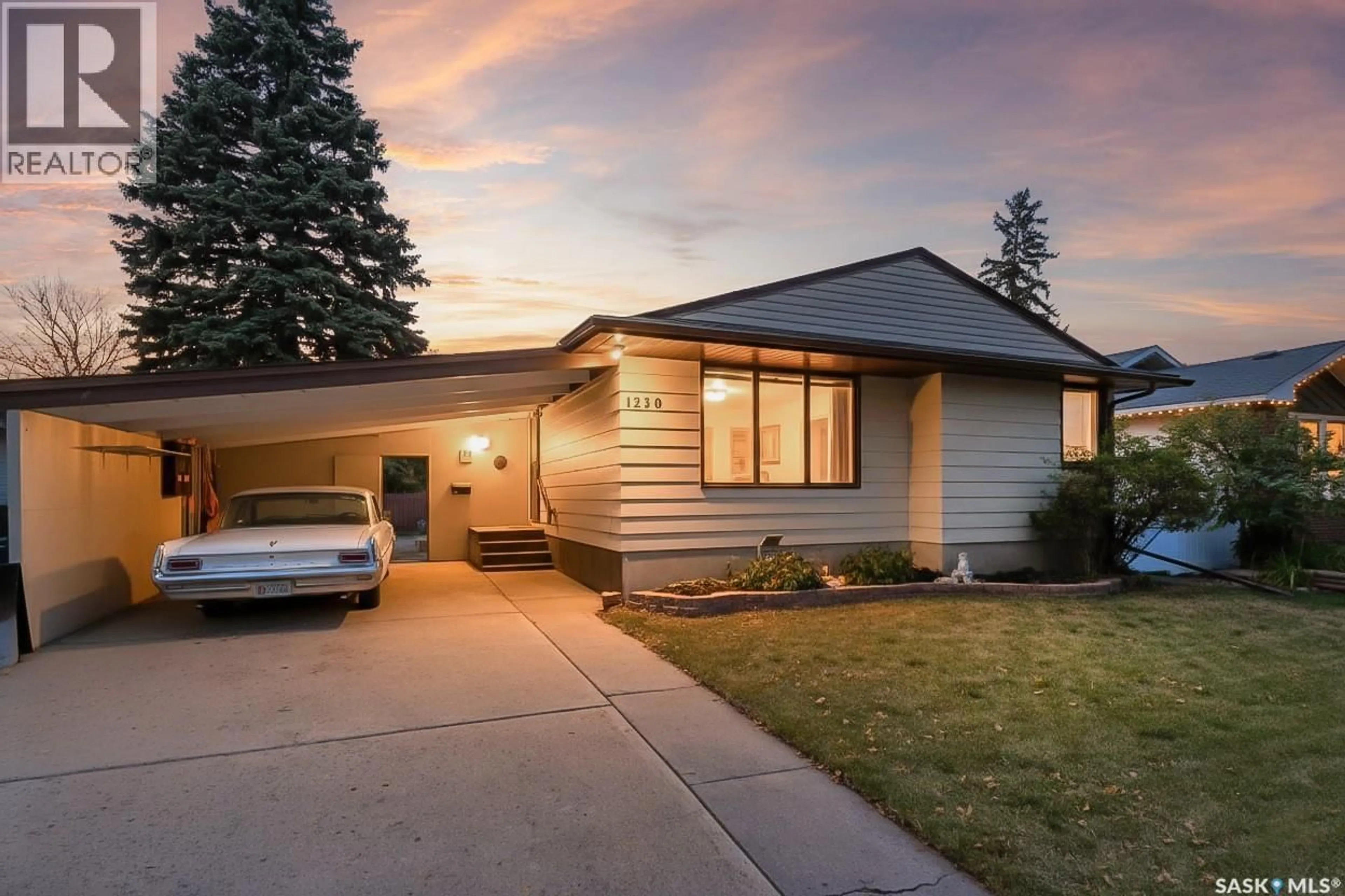 Home with vinyl exterior material, street for 1230 GRACE STREET, Moose Jaw Saskatchewan S6H3C7