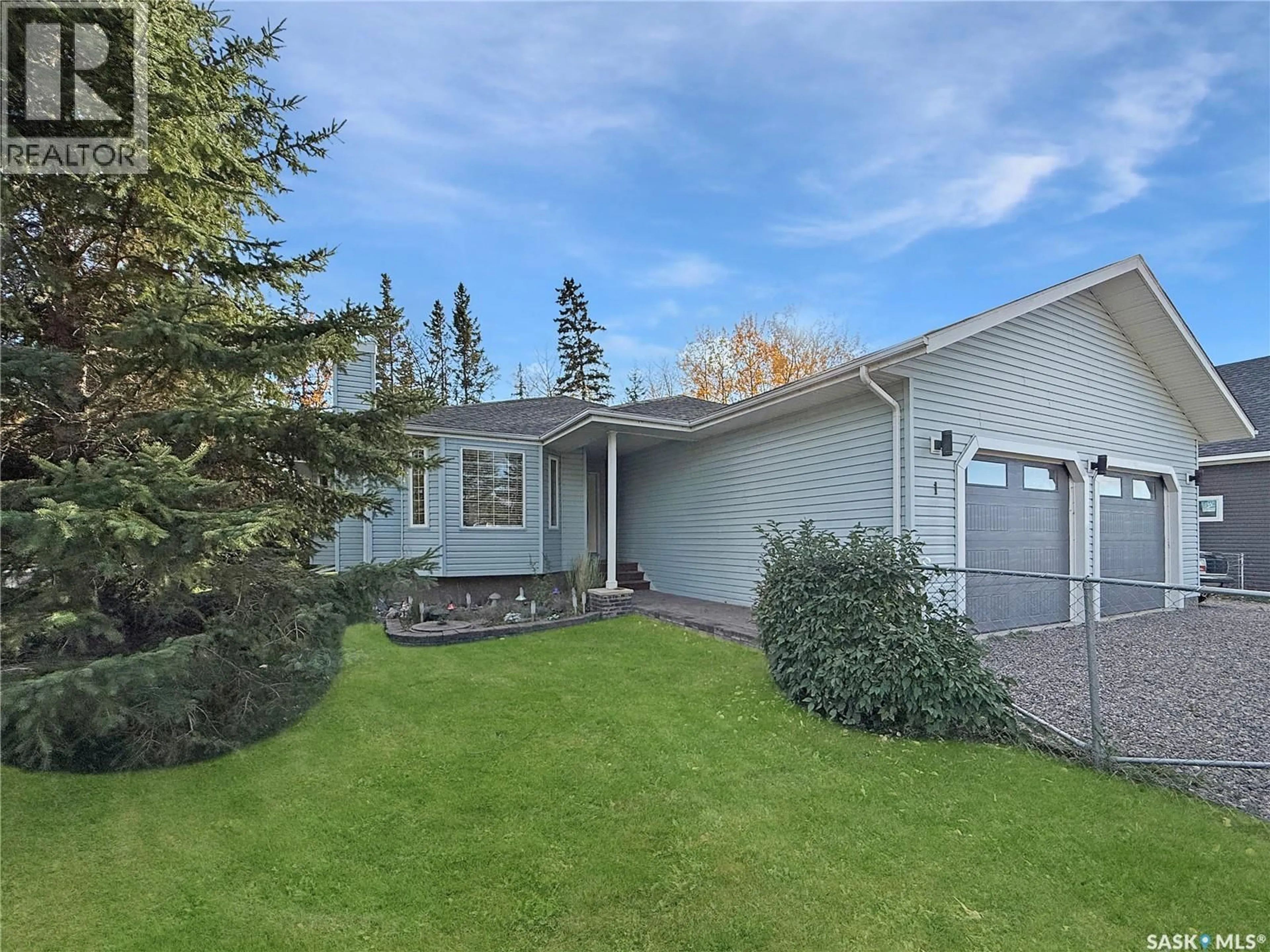 Home with vinyl exterior material, street for 1 PINE DRIVE, Candle Lake Saskatchewan S0J3E0