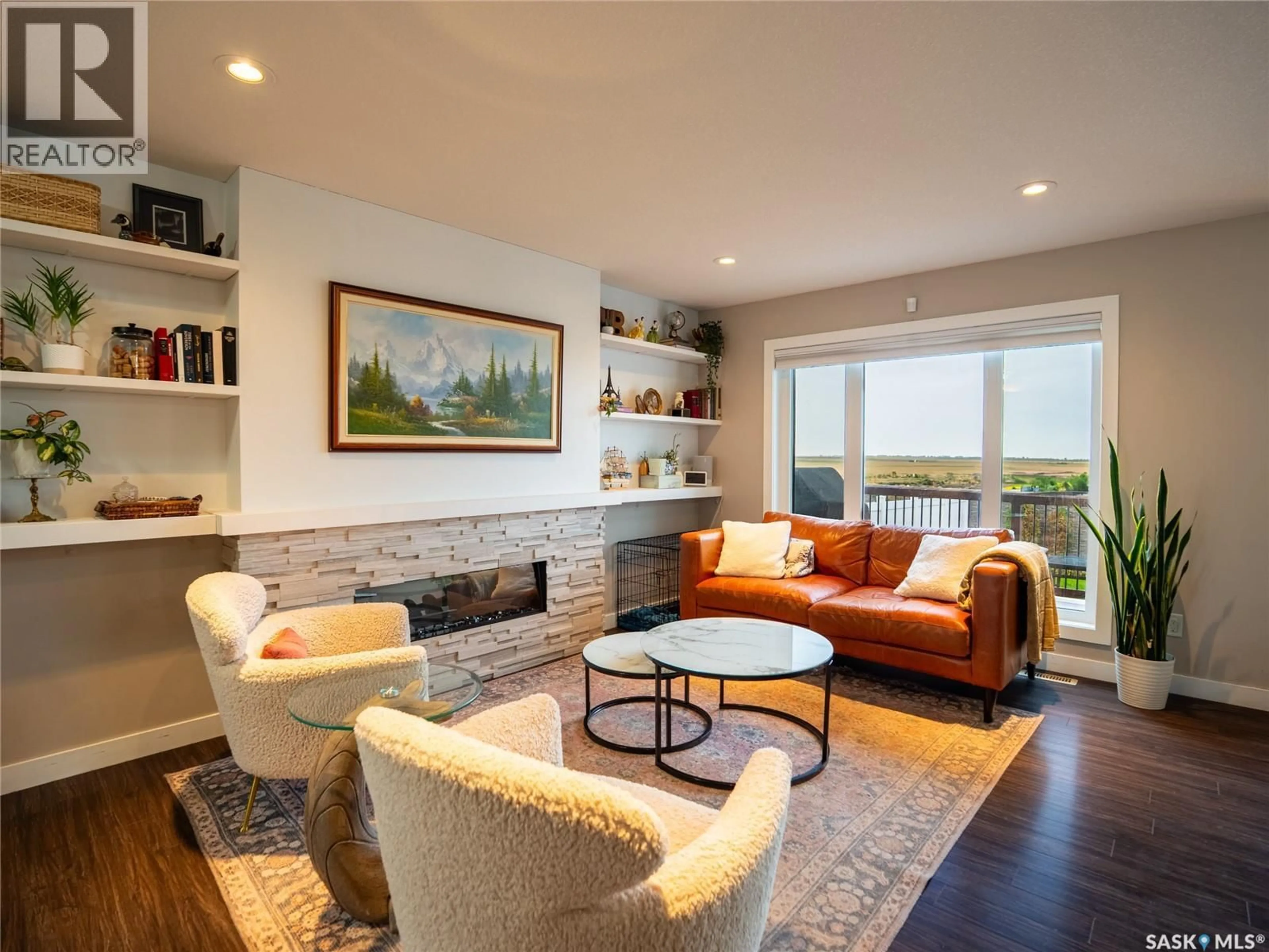 Living room with furniture, wood/laminate floor for 234 SHILLINGTON ROAD, Regina Saskatchewan S4Y0C4