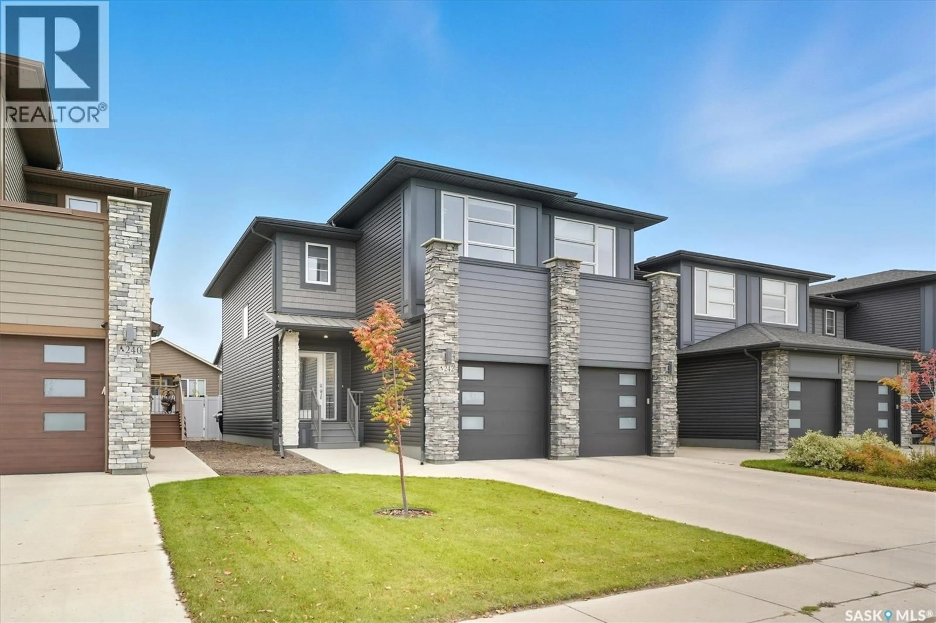 Home with brick exterior material, street for 242 BRIGHTON GATE, Saskatoon Saskatchewan S7V0R1