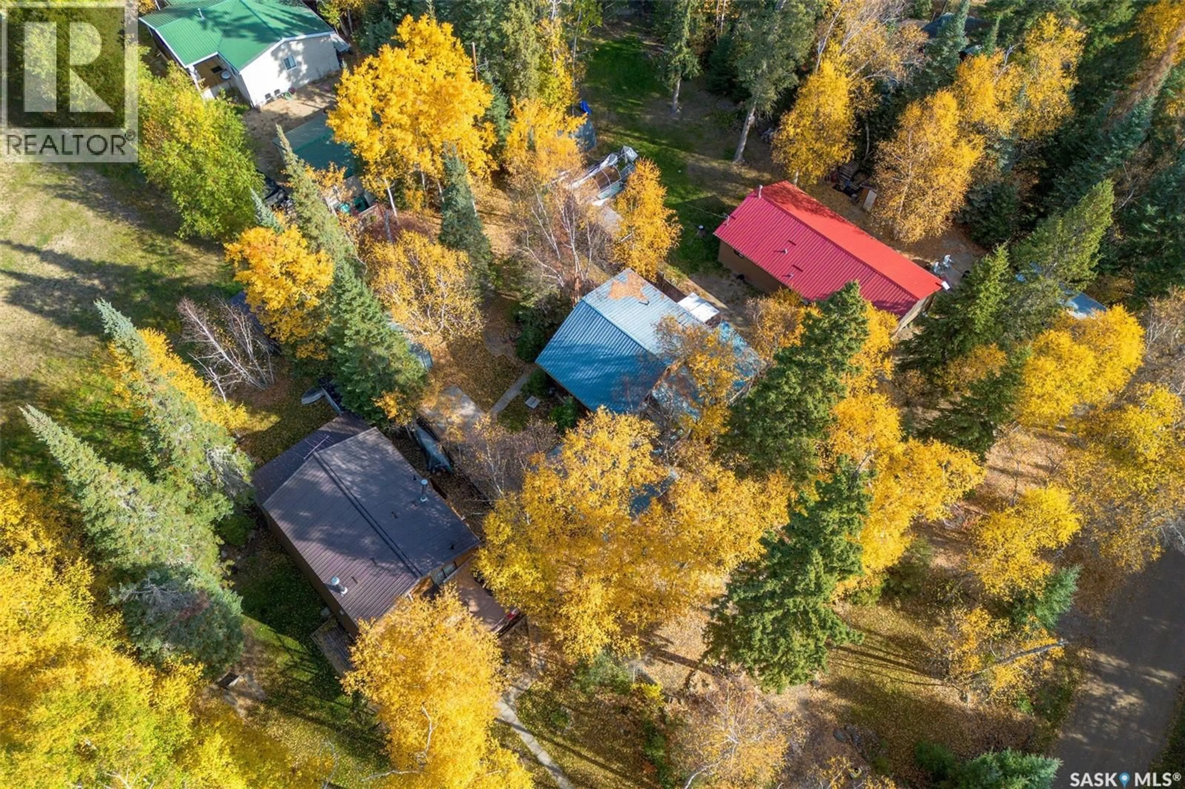 A pic from outside/outdoor area/front of a property/back of a property/a pic from drone, forest/trees view for 206 CONNIE PLACE, Lakeland Rm No. 521 Saskatchewan S0J0G0
