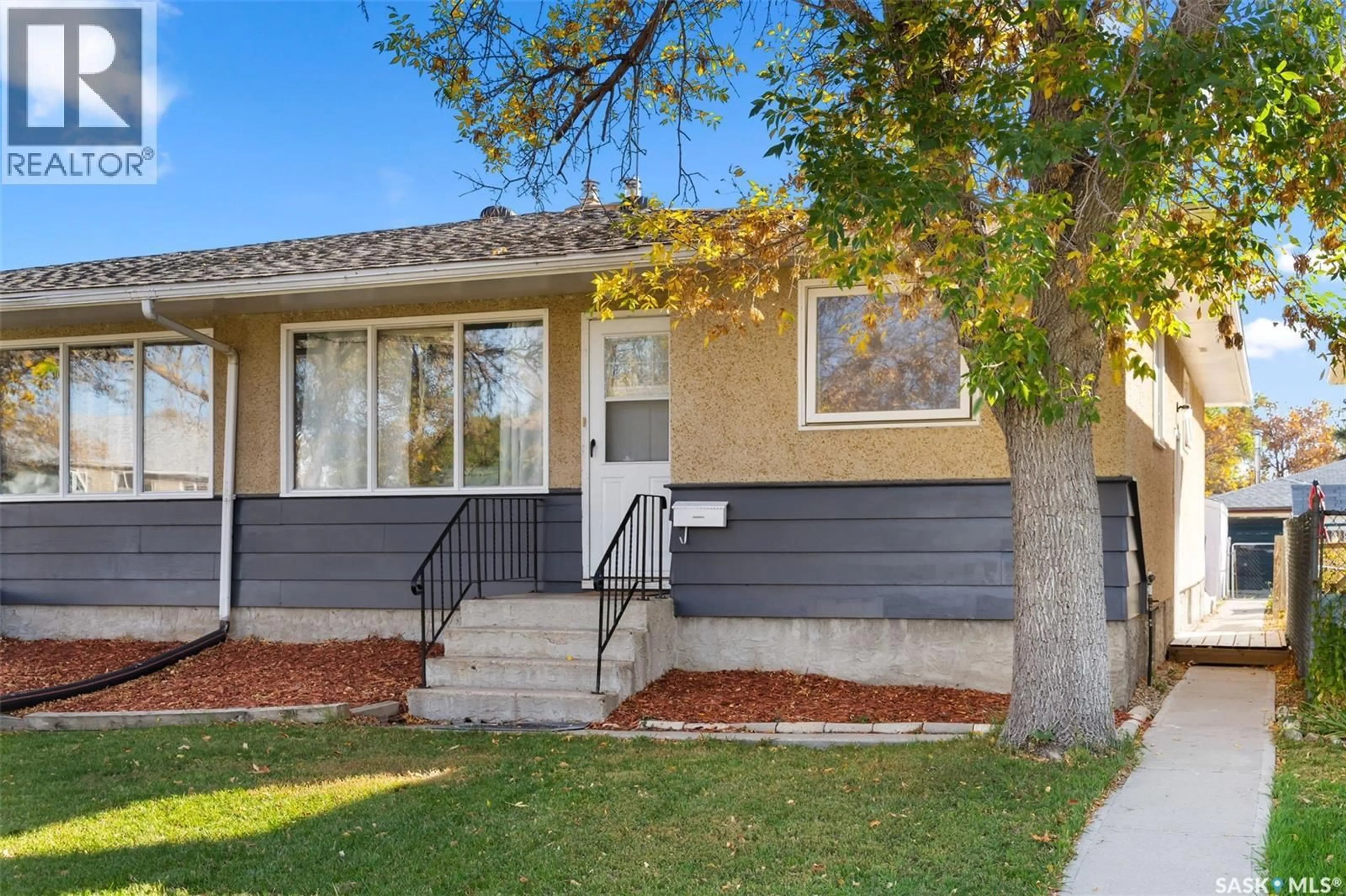 Home with vinyl exterior material, street for 1437 RUPERT STREET, Regina Saskatchewan S4N1V9