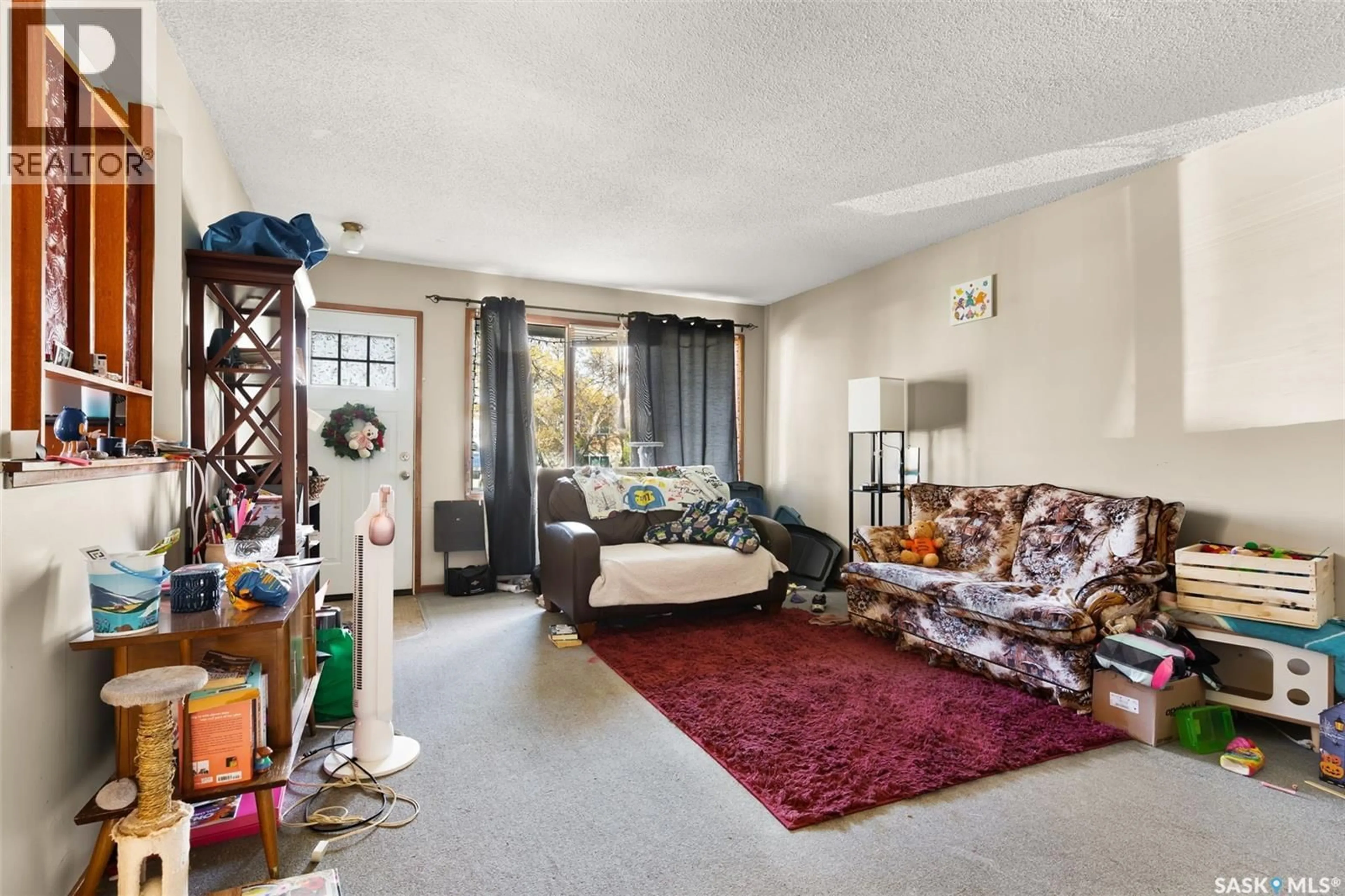 Living room with furniture, unknown for 1437 RUPERT STREET, Regina Saskatchewan S4N1V9