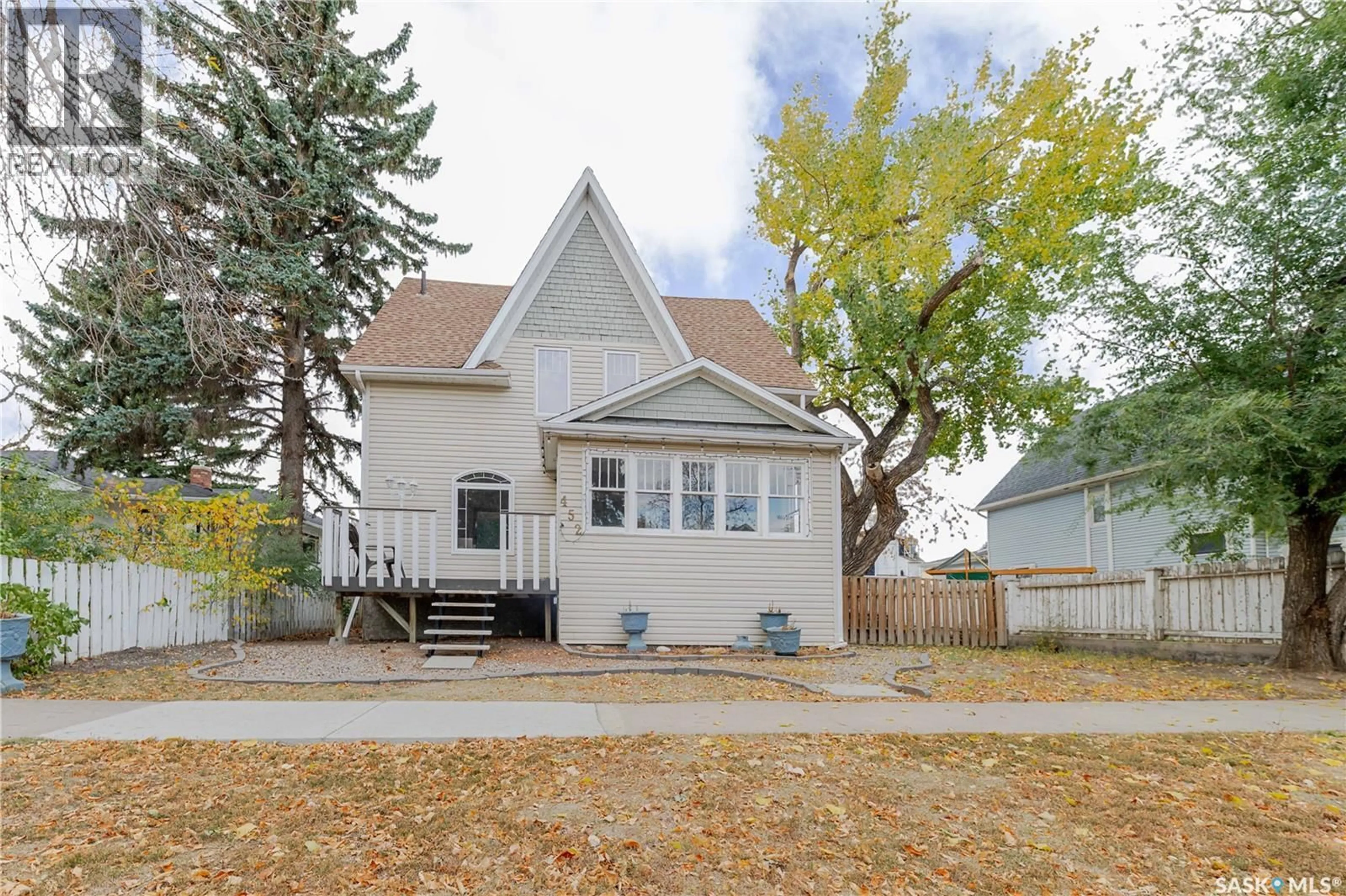 Home with vinyl exterior material, street for E - 452 STADACONA STREET, Moose Jaw Saskatchewan S6H0J8
