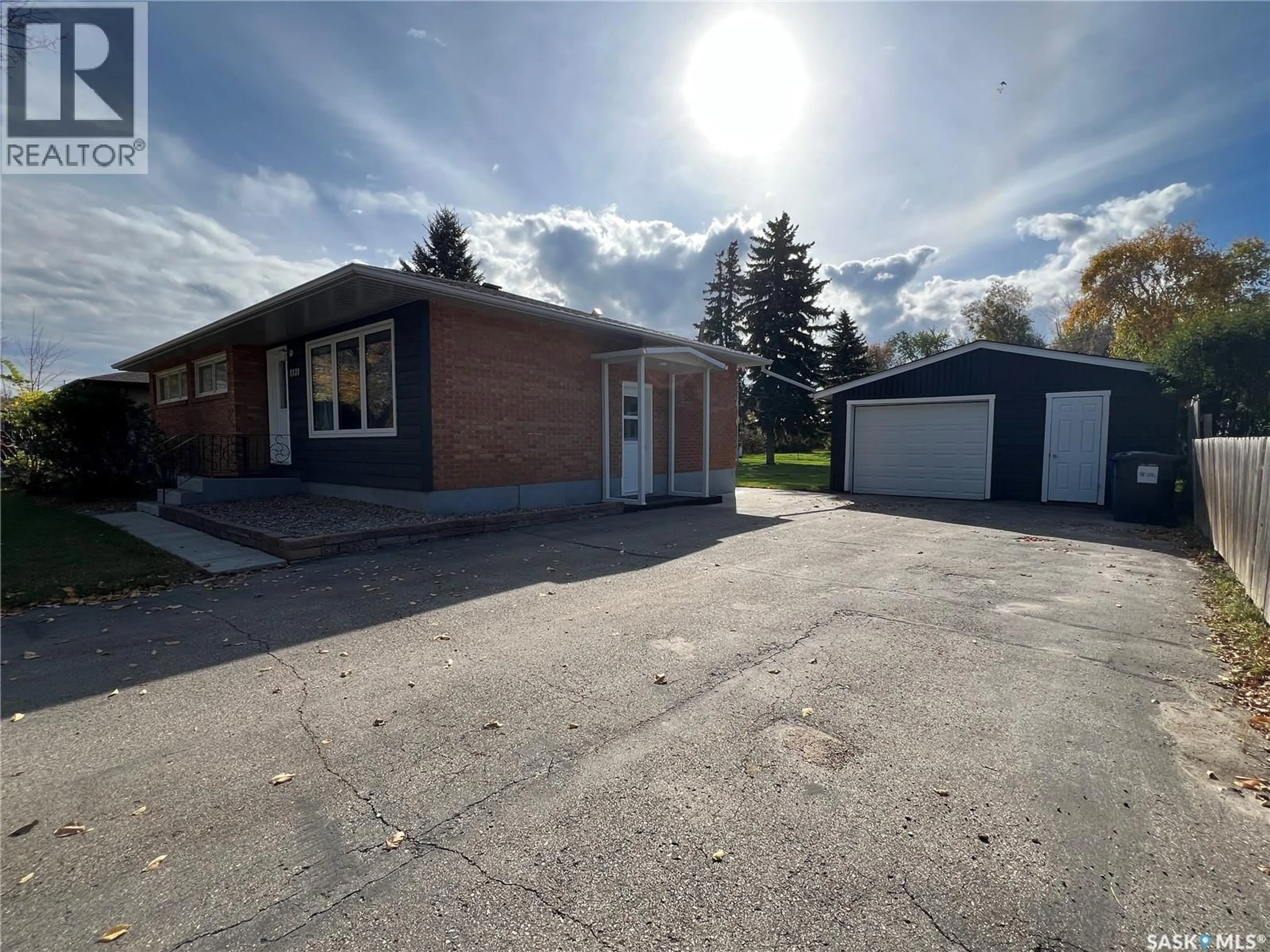 A pic from outside/outdoor area/front of a property/back of a property/a pic from drone, street for 1121 ASQUITH DRIVE, Esterhazy Saskatchewan S0A0X0
