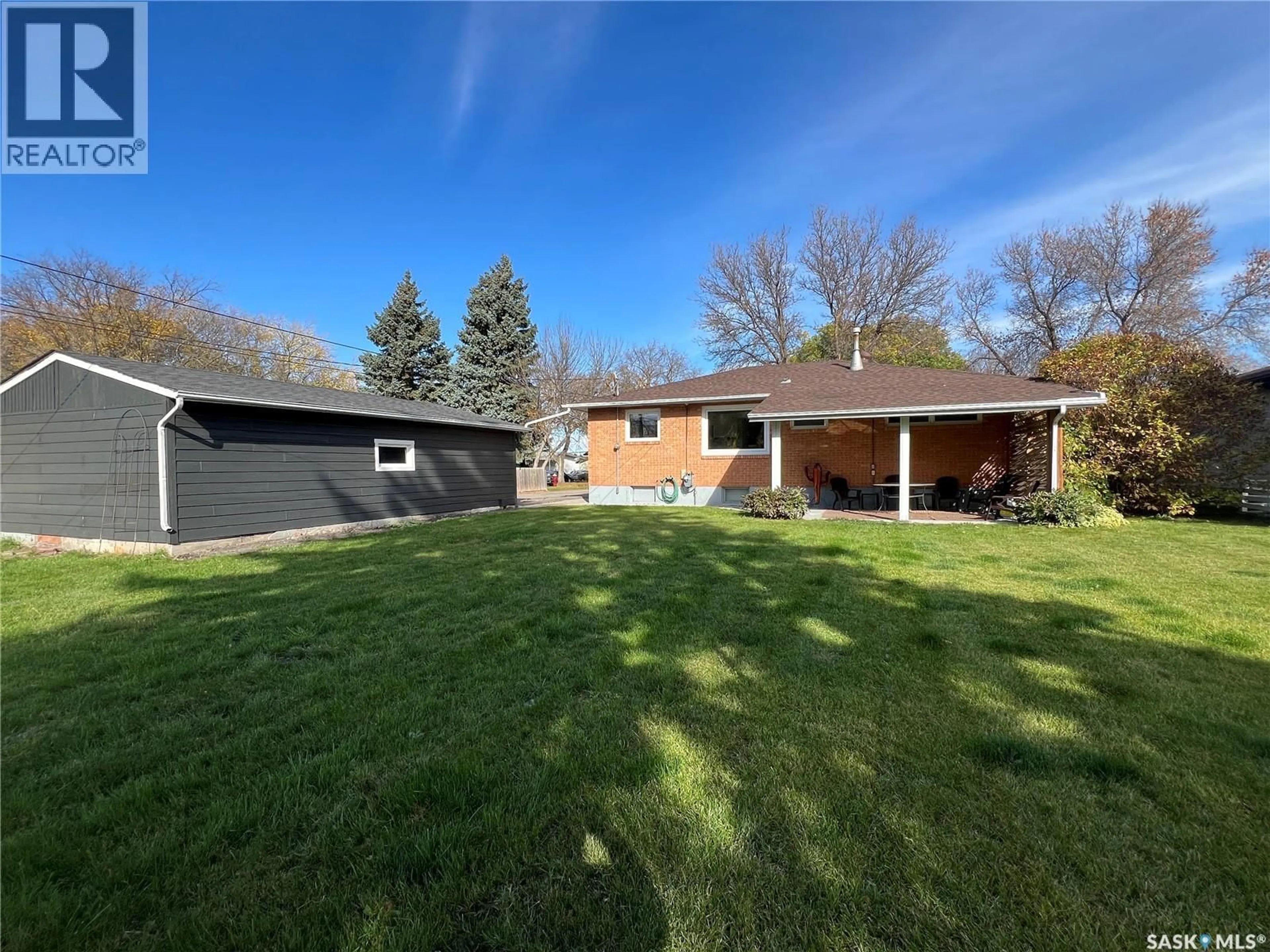 A pic from outside/outdoor area/front of a property/back of a property/a pic from drone, street for 1121 ASQUITH DRIVE, Esterhazy Saskatchewan S0A0X0