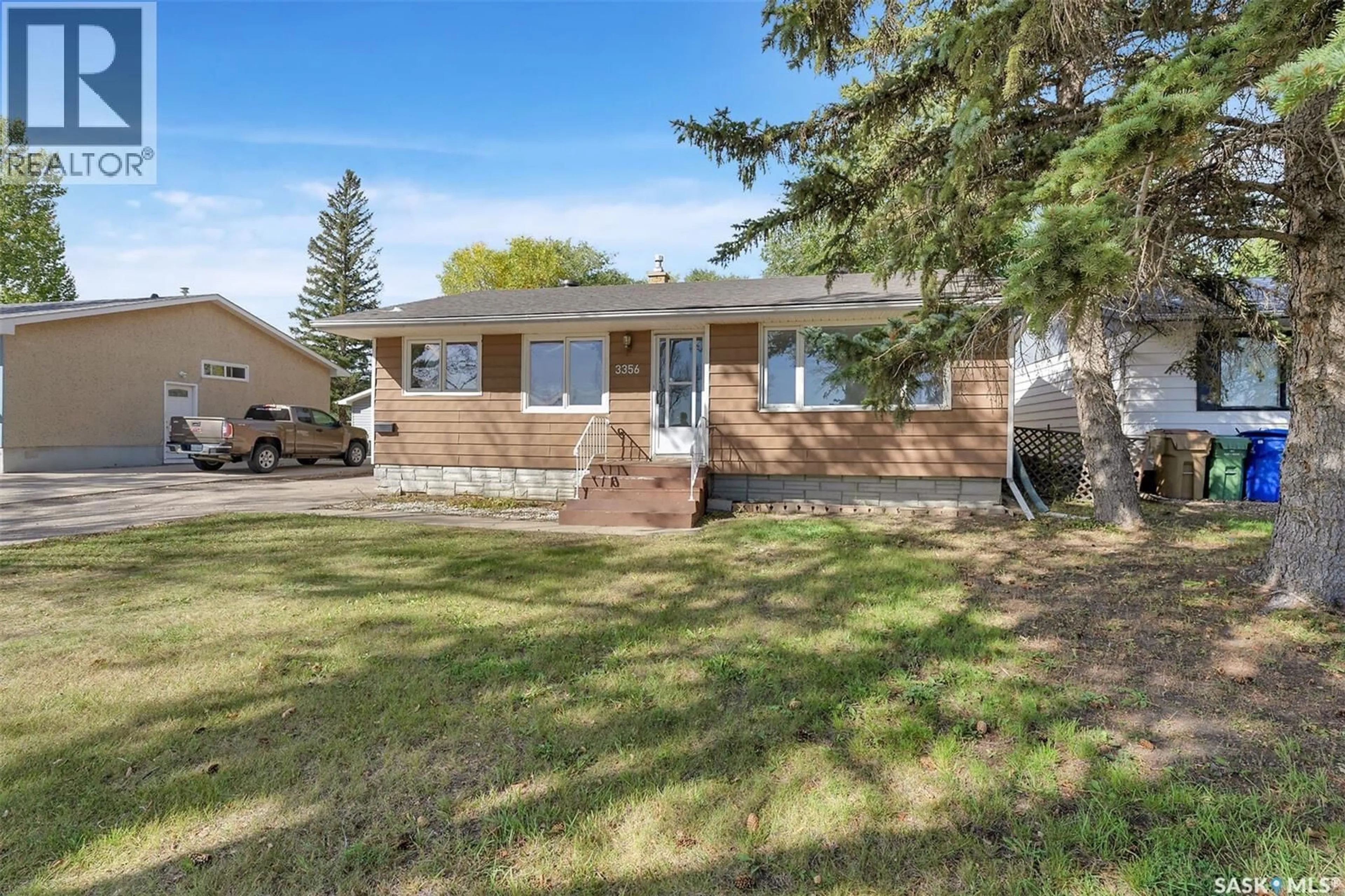Home with vinyl exterior material, street for 3356 GRANT ROAD, Regina Saskatchewan S4S5H5