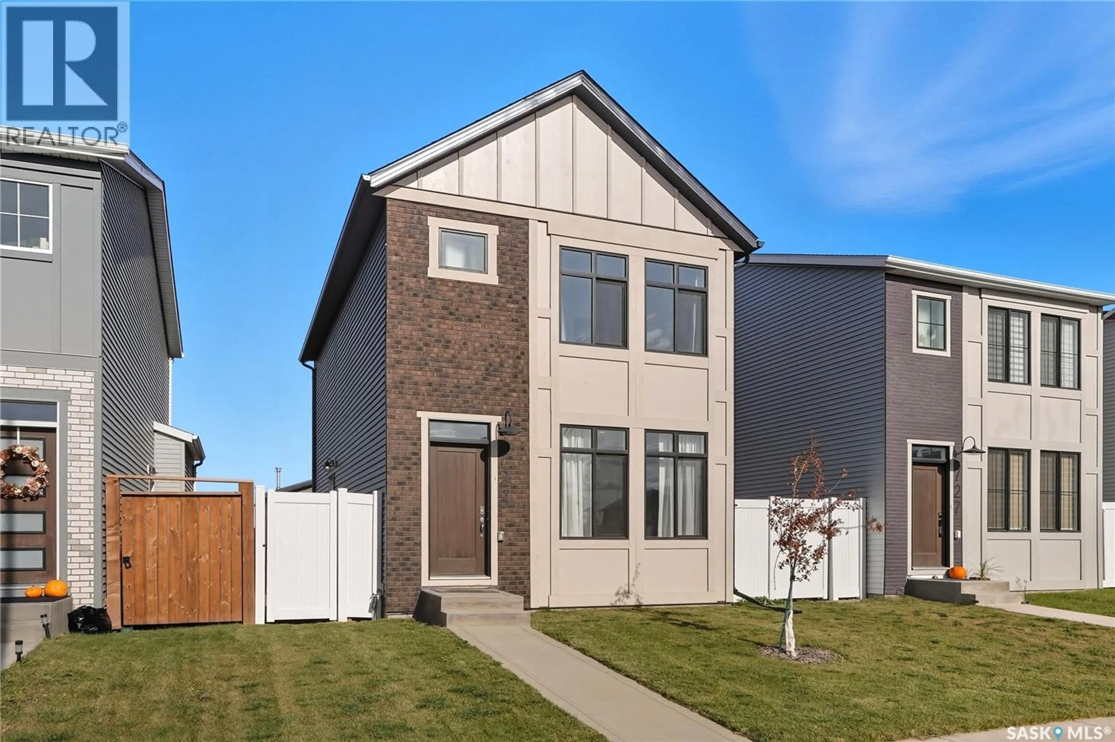 Home with brick exterior material, street for 723 HENRY DAYDAY ROAD, Saskatoon Saskatchewan S7W1H5