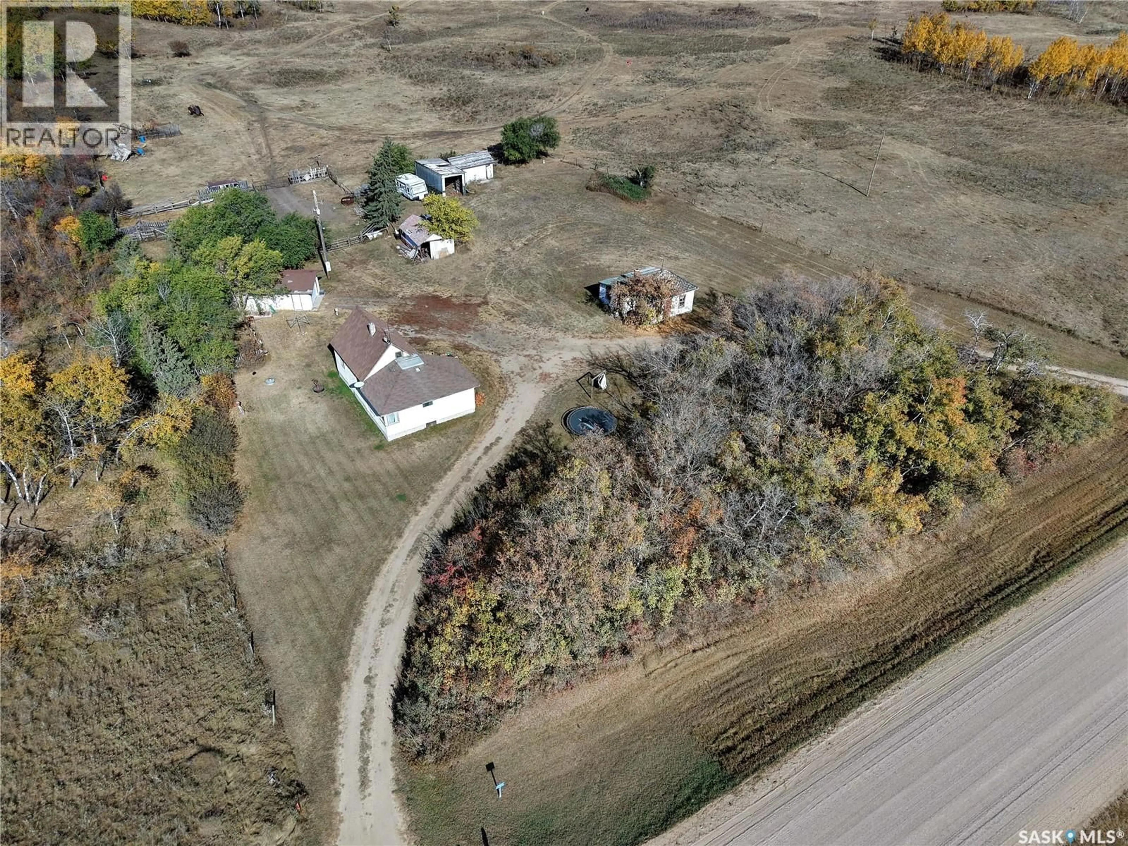 A pic from outside/outdoor area/front of a property/back of a property/a pic from drone, street for BRISTOW ACREAGE, Corman Park Rm No. 344 Saskatchewan S7K5W1