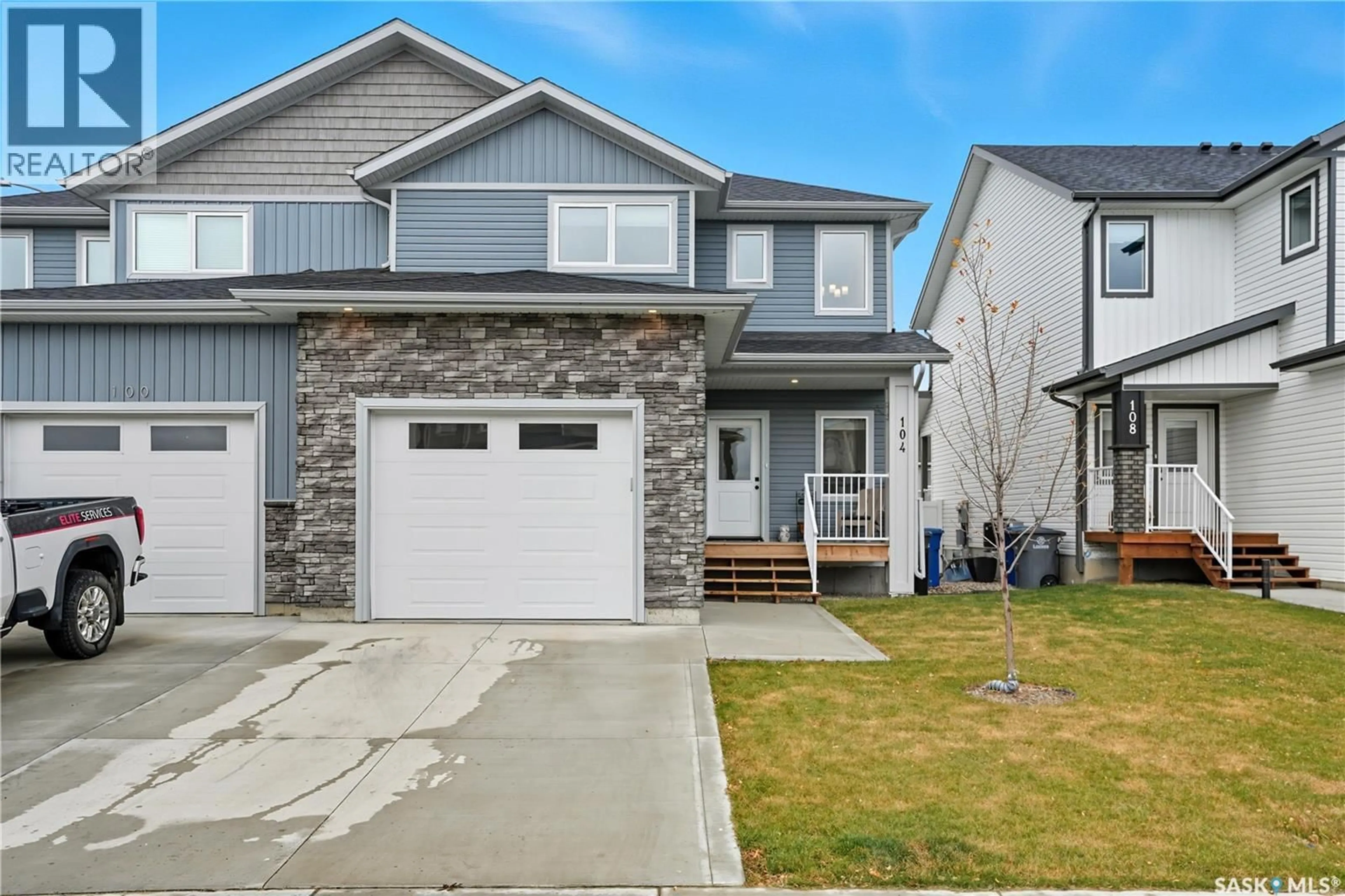 Home with vinyl exterior material, street for 104 ECHO LANE, Martensville Saskatchewan S0K2T1