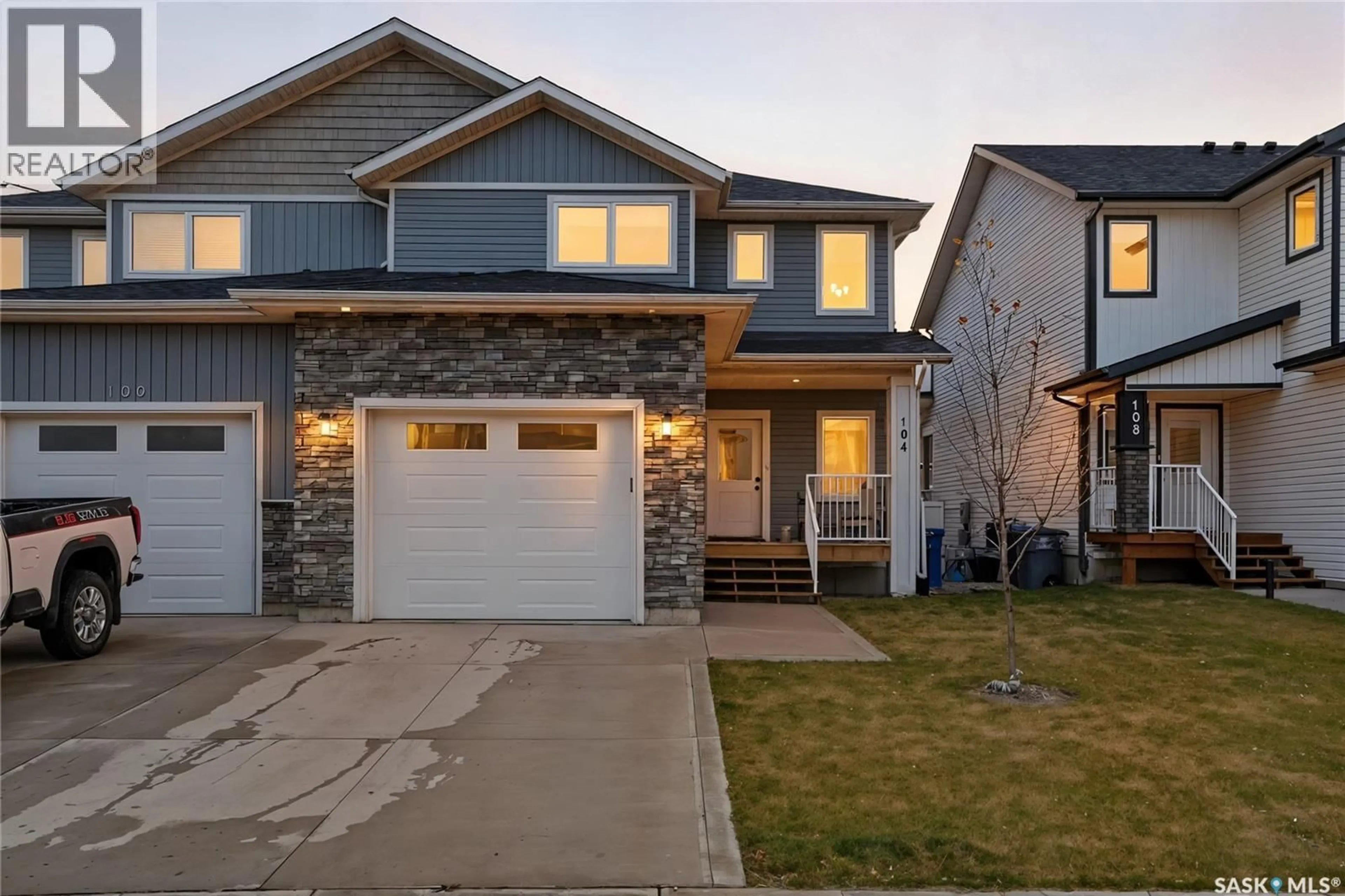 Home with vinyl exterior material, street for 104 ECHO LANE, Martensville Saskatchewan S0K2T1