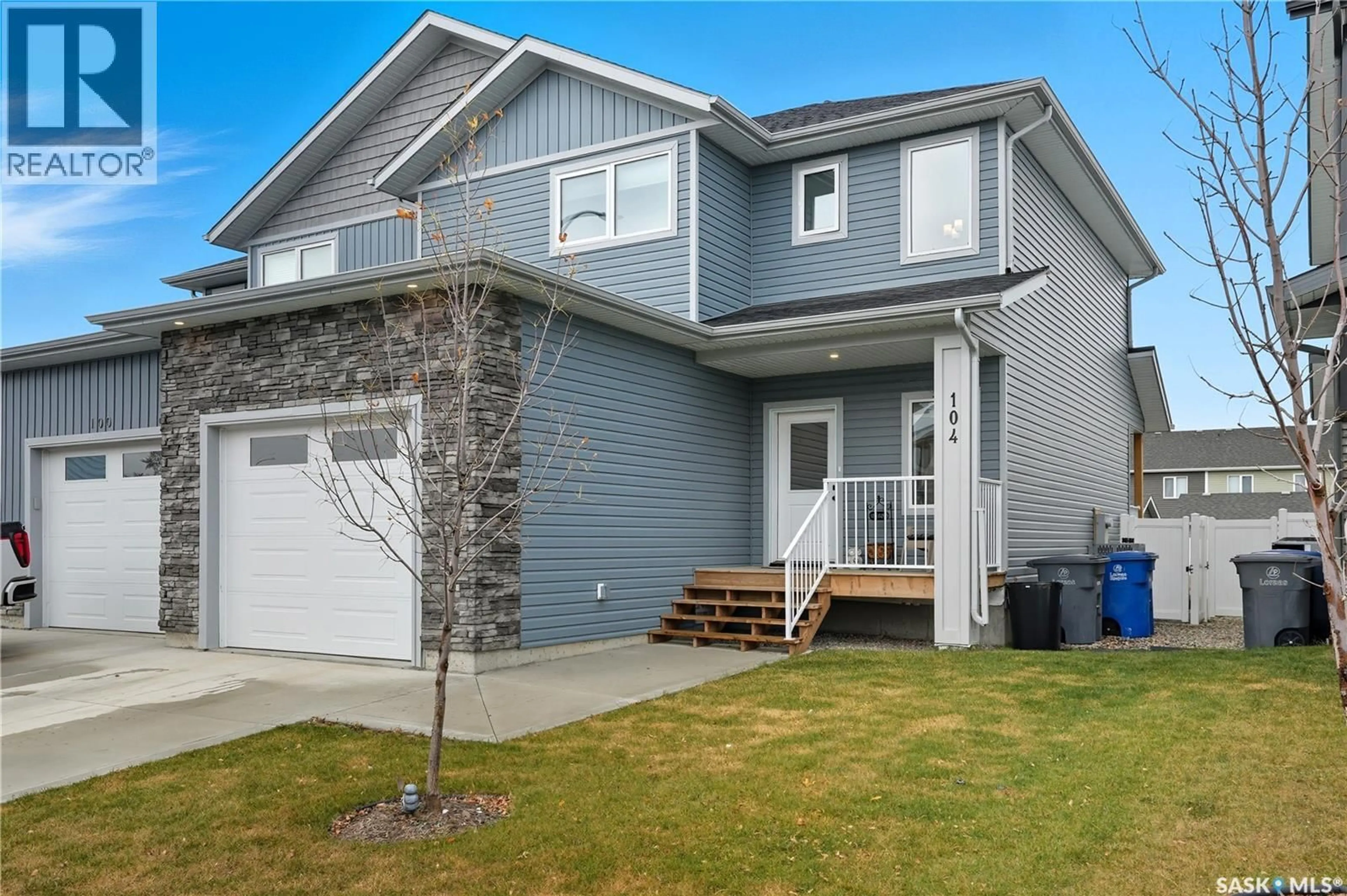Home with vinyl exterior material, street for 104 ECHO LANE, Martensville Saskatchewan S0K2T1