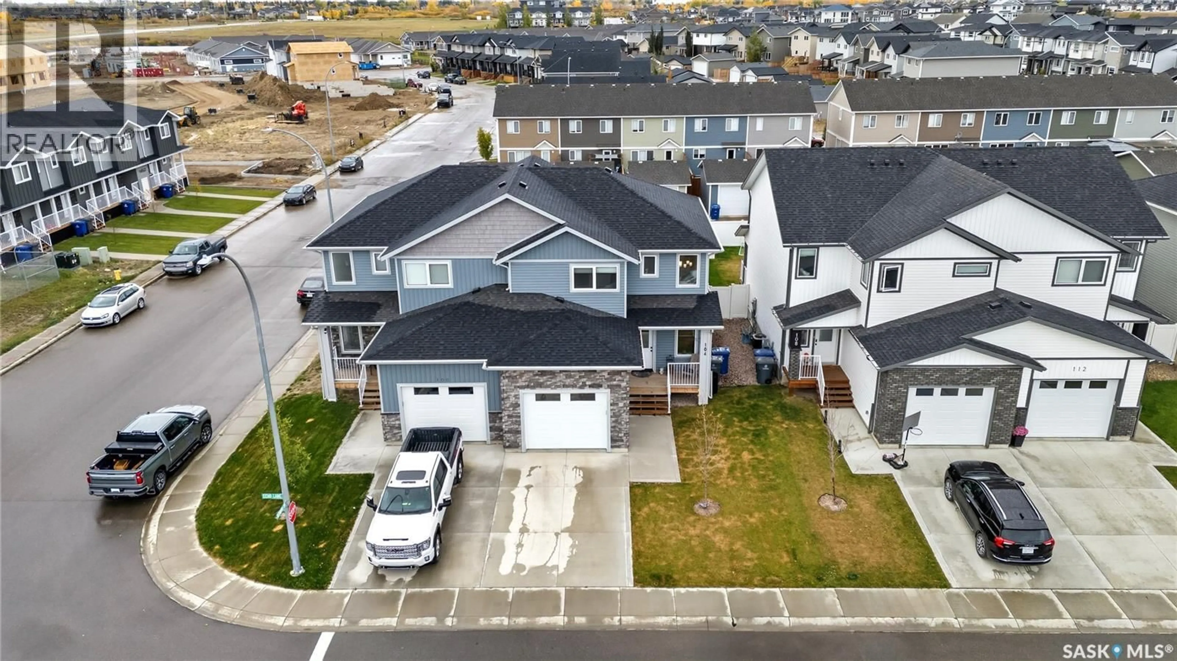 A pic from outside/outdoor area/front of a property/back of a property/a pic from drone, street for 104 ECHO LANE, Martensville Saskatchewan S0K2T1