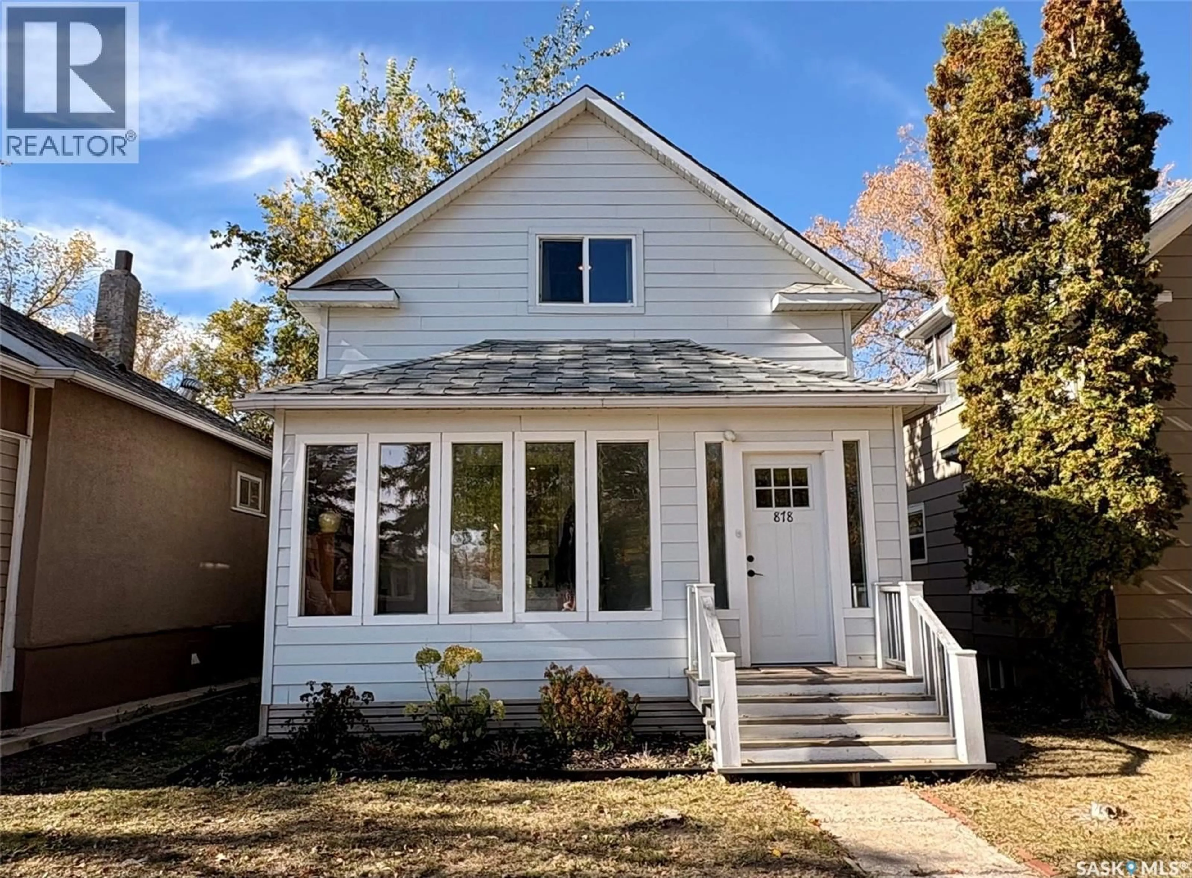 Home with vinyl exterior material, street for 878 4TH AVENUE, Moose Jaw Saskatchewan S6H1H7