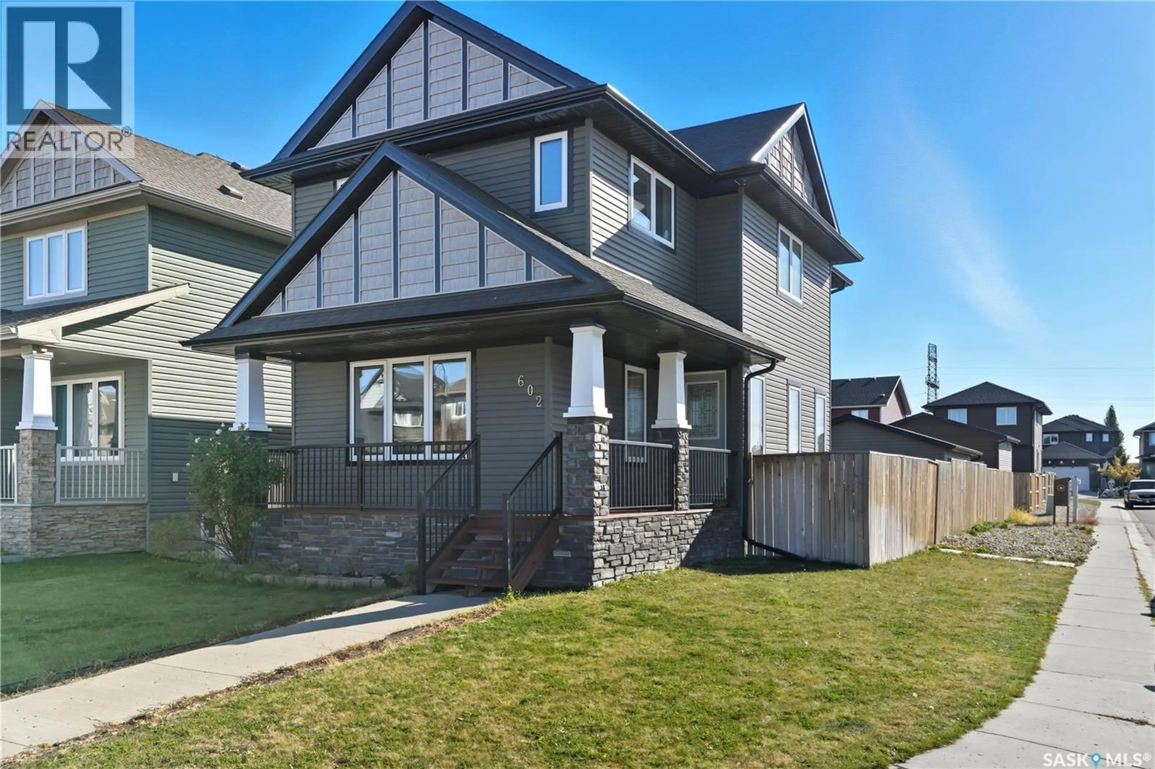 Home with vinyl exterior material, street for 602 KOLYNCHUK COURT, Saskatoon Saskatchewan S7T0W1