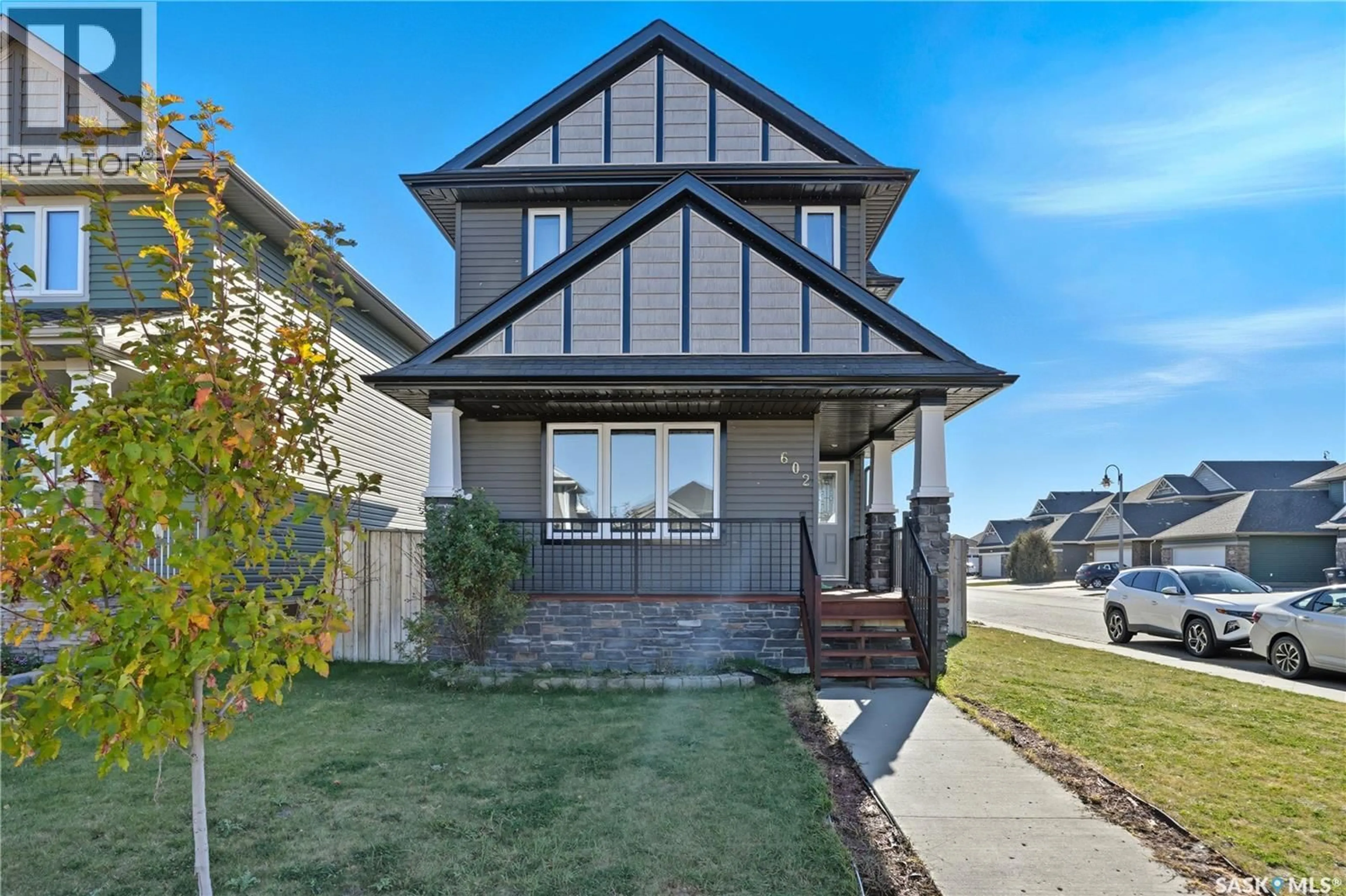 Home with vinyl exterior material, street for 602 KOLYNCHUK COURT, Saskatoon Saskatchewan S7T0W1