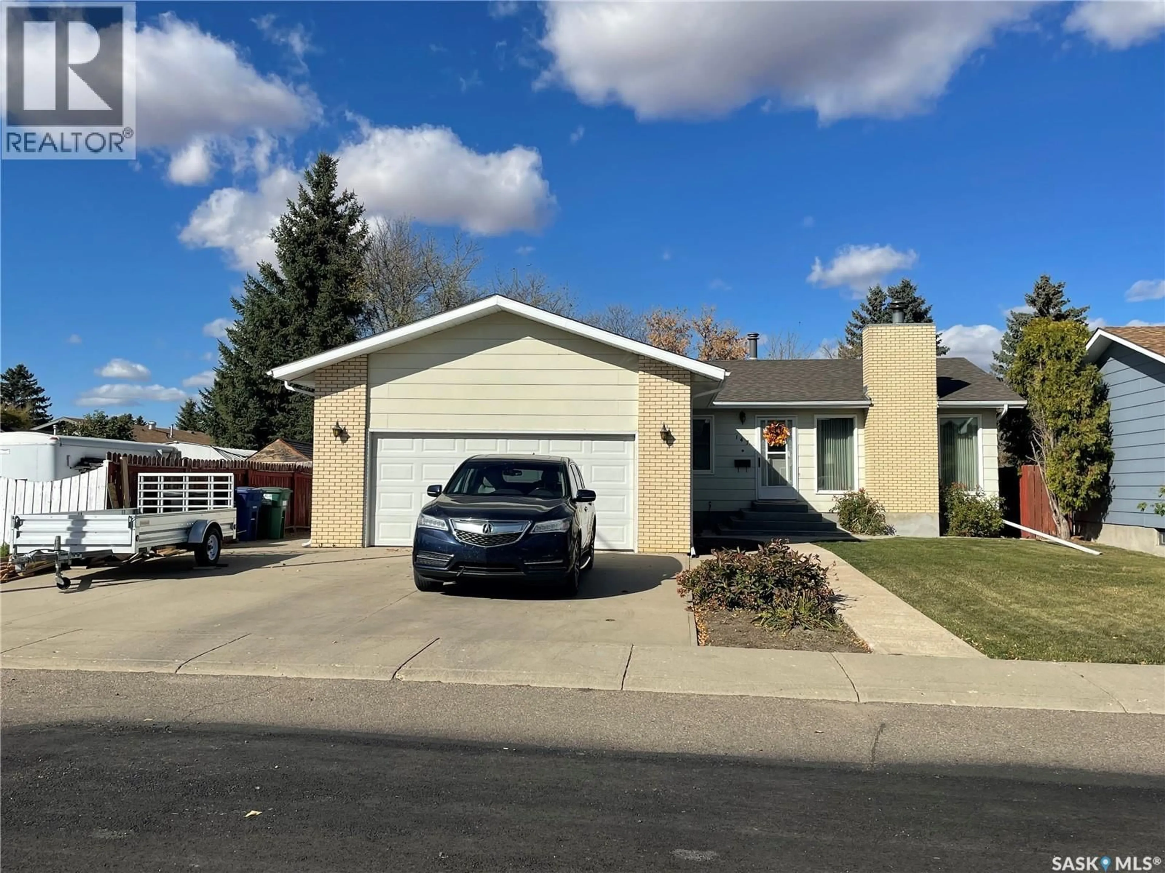 Home with vinyl exterior material, street for 147 ARRAND CRESCENT, Saskatoon Saskatchewan S7M5A3