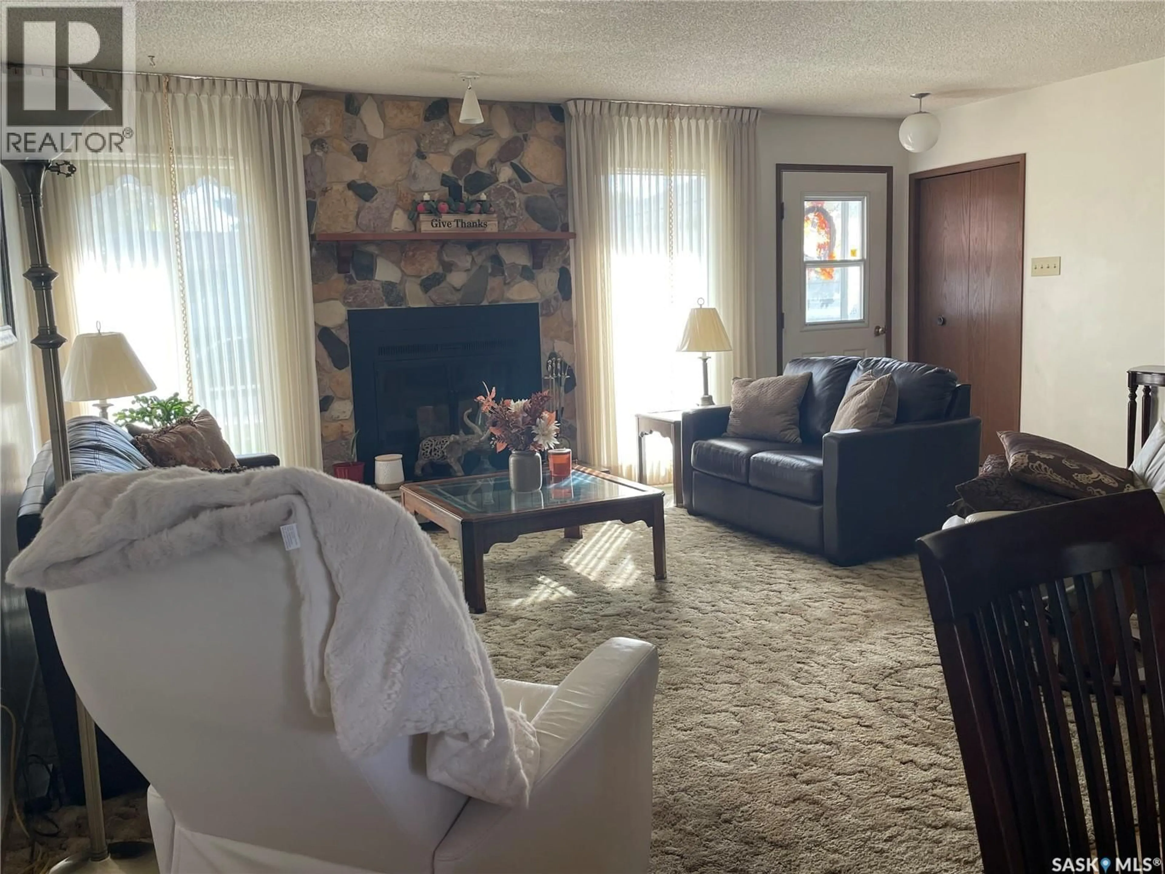 Living room with furniture, unknown for 147 ARRAND CRESCENT, Saskatoon Saskatchewan S7M5A3