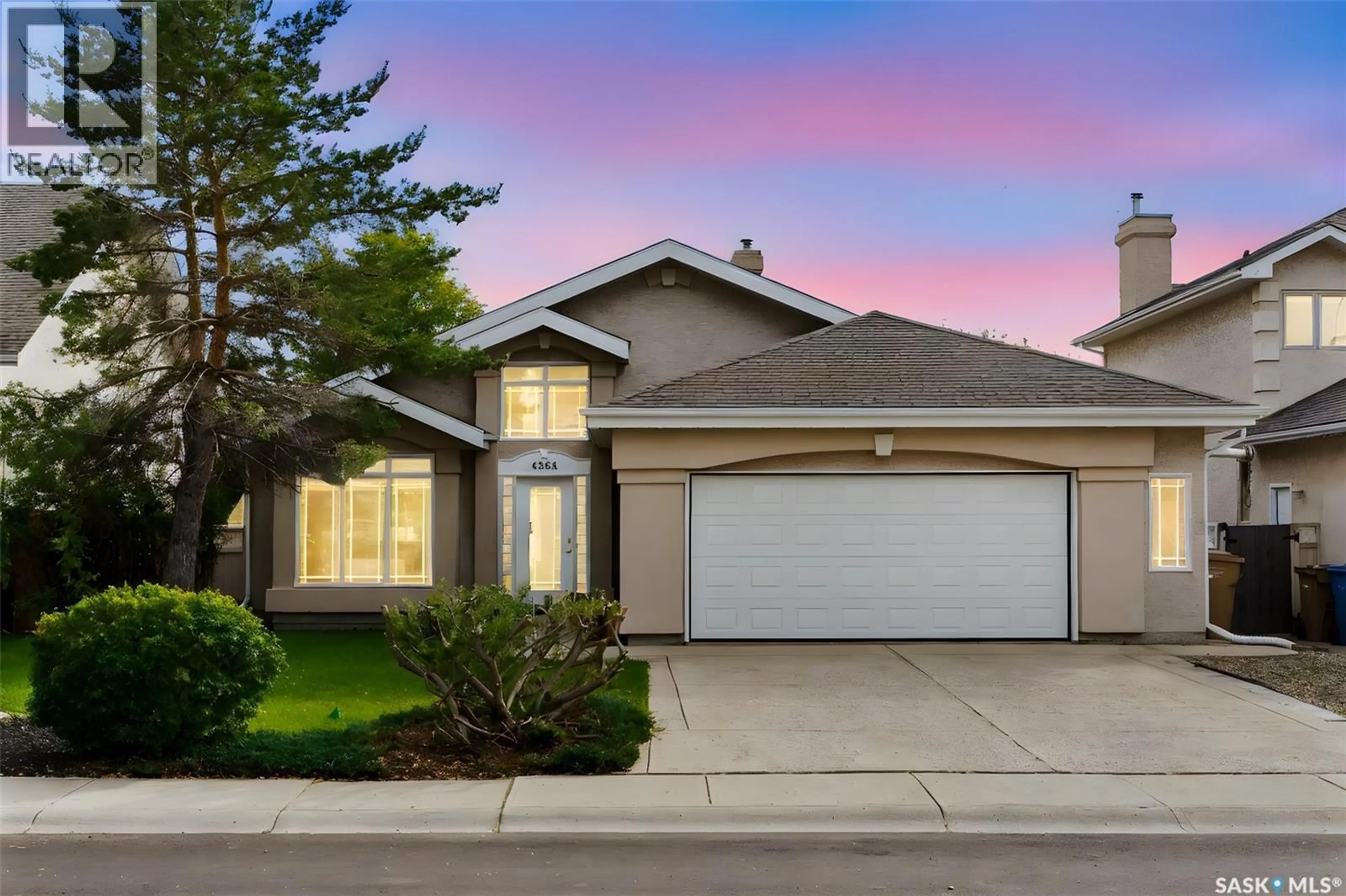 Home with vinyl exterior material, street for 4284 WASCANA RIDGE, Regina Saskatchewan S4V2T3