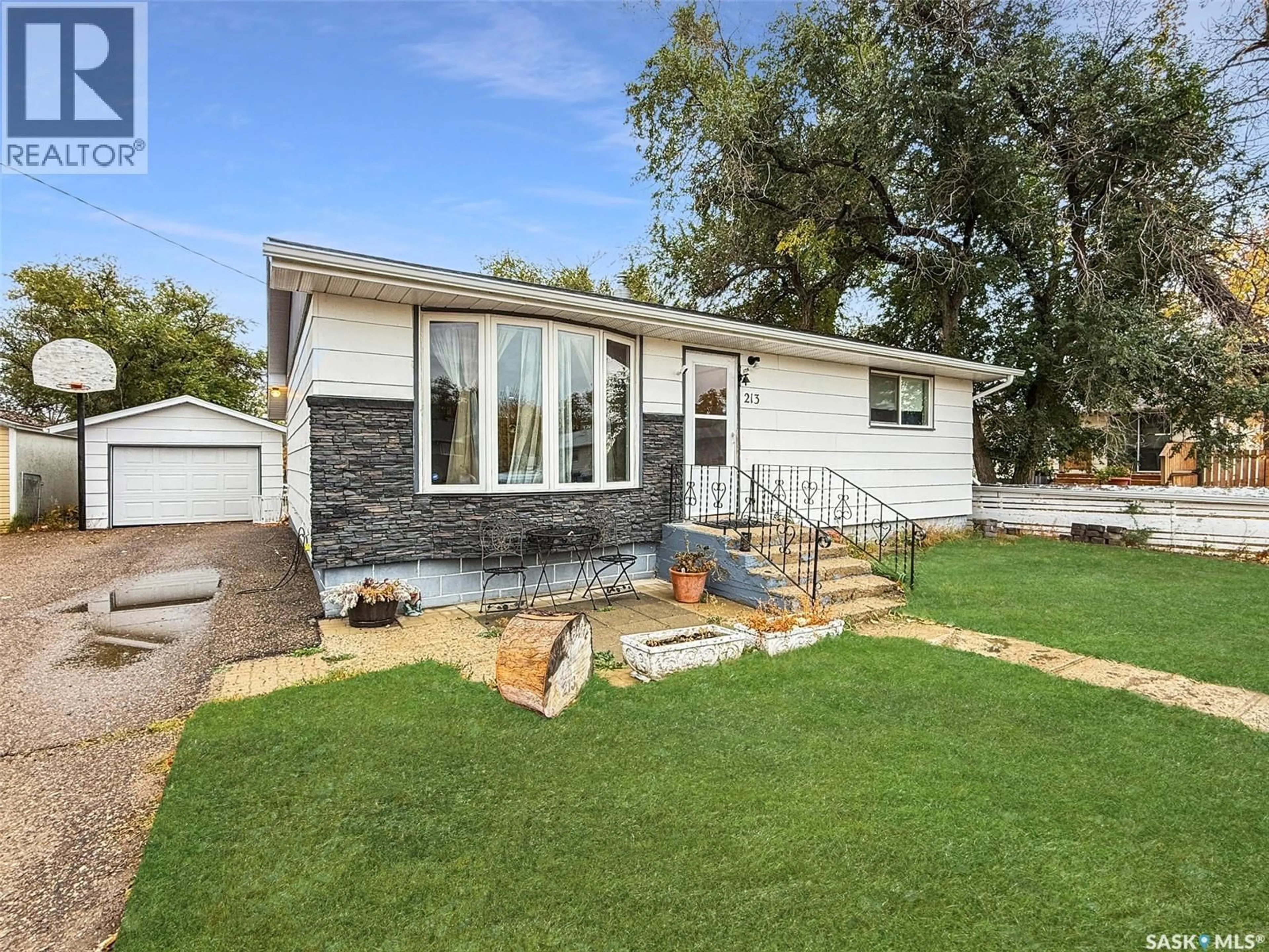 Home with vinyl exterior material, street for 213 LOBETHAL STREET, Herbert Saskatchewan S0H2A0