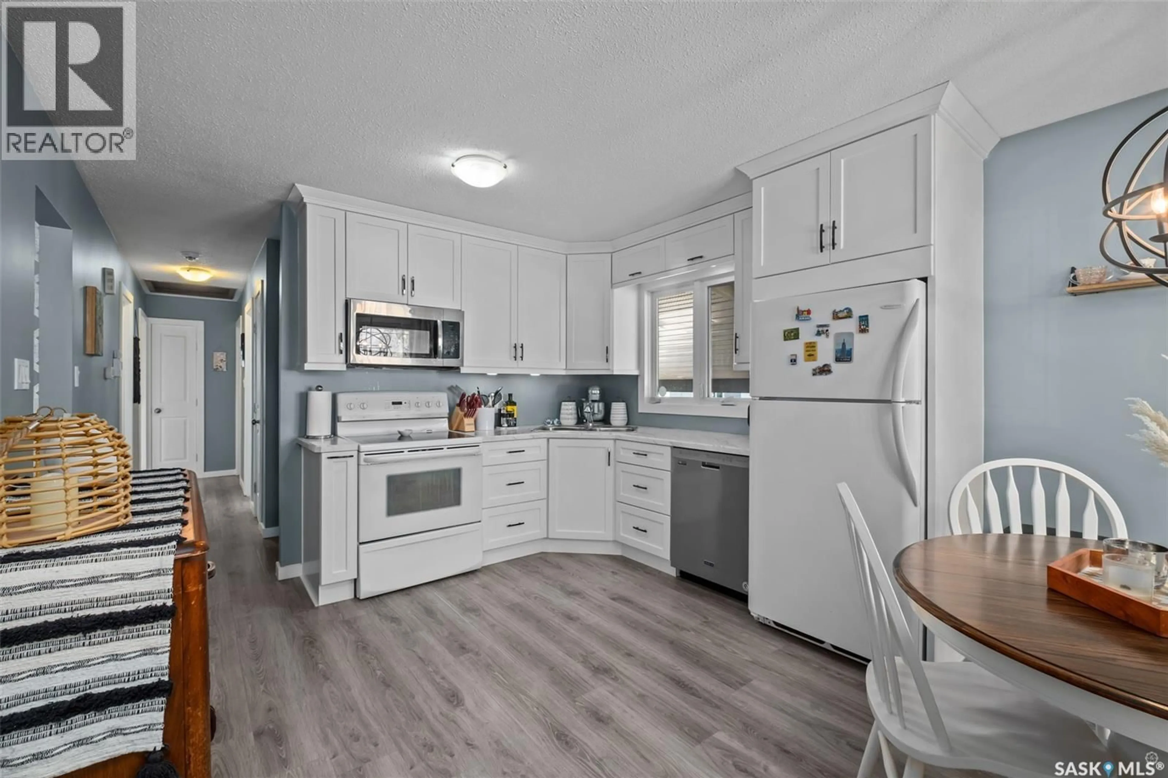 Open concept kitchen, ceramic/tile floor for 1361 3RD STREET, Prince Albert Saskatchewan S6V0J8