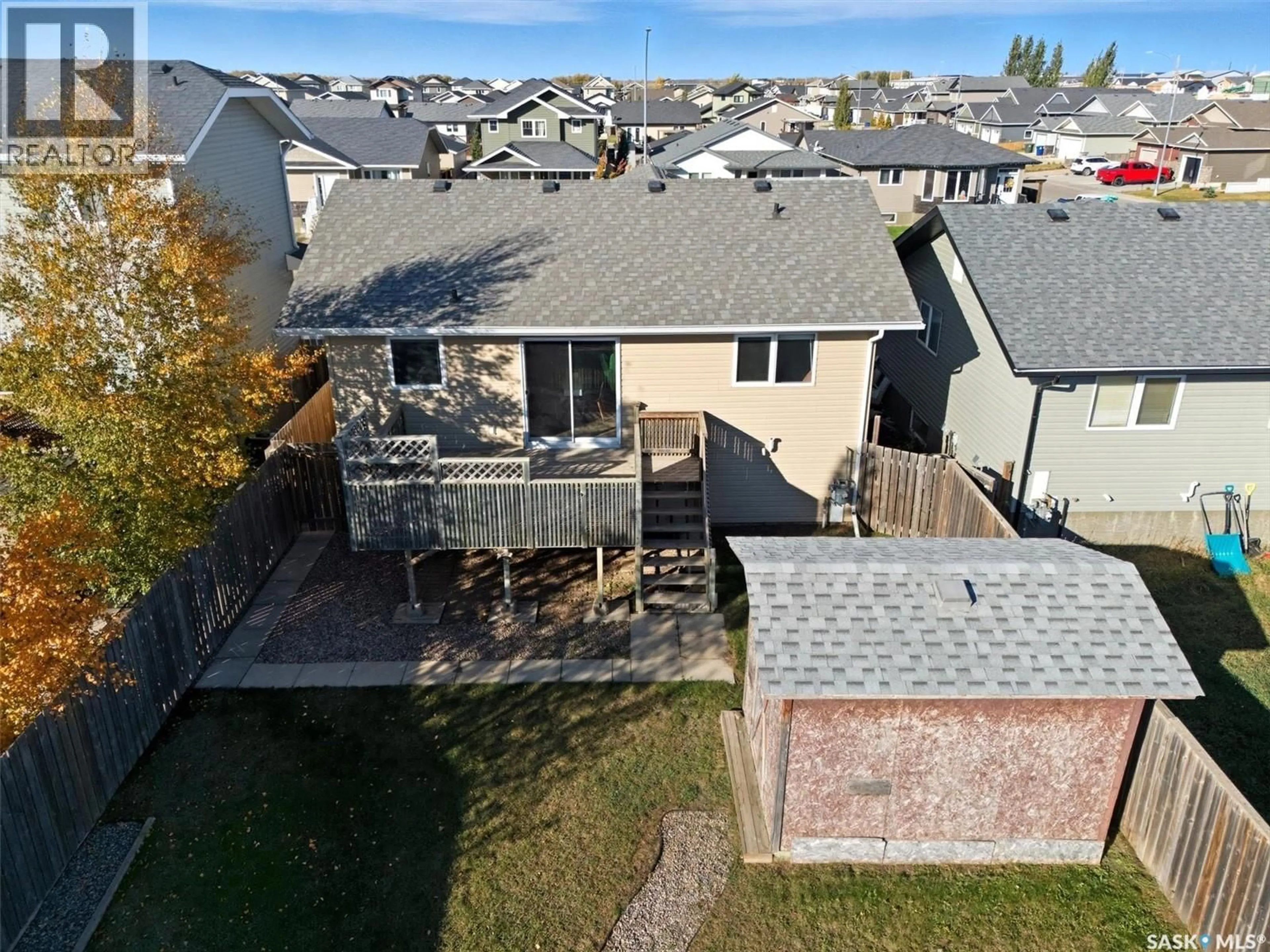 A pic from outside/outdoor area/front of a property/back of a property/a pic from drone, unknown for 220 WARWICK CRESCENT, Warman Saskatchewan S0K4S0