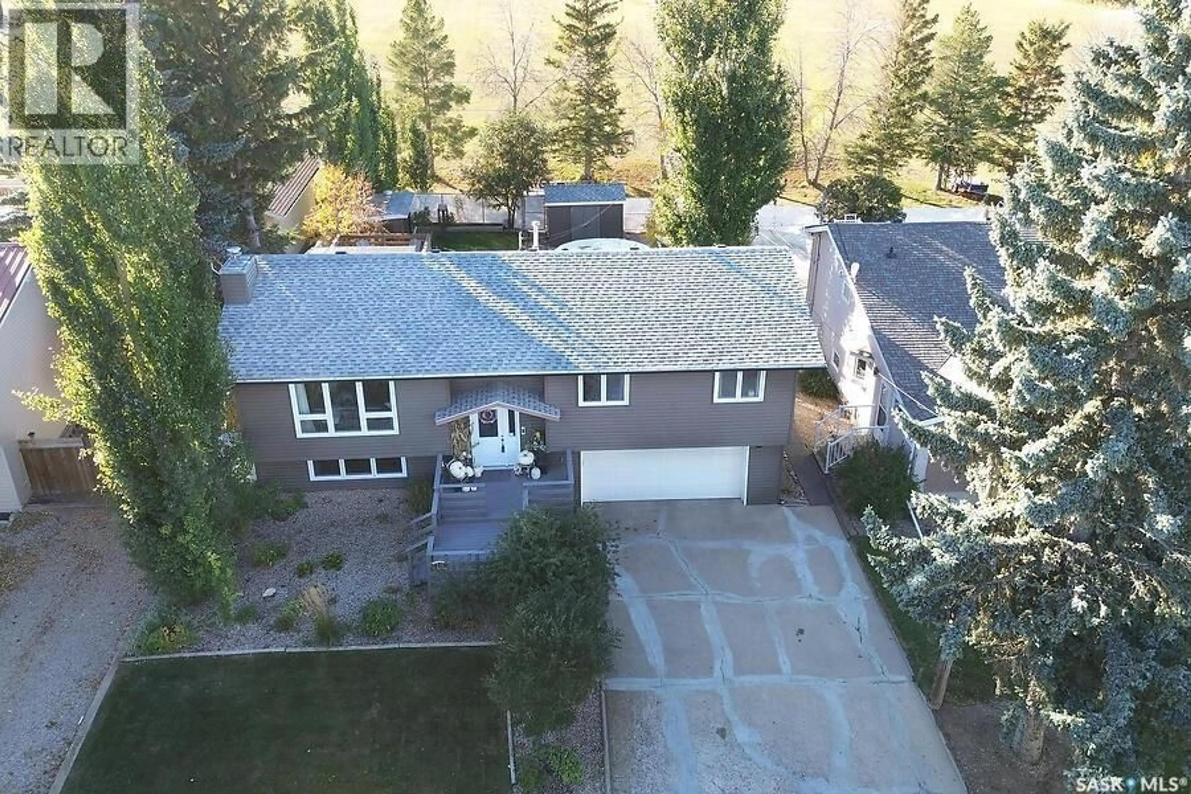 A pic from outside/outdoor area/front of a property/back of a property/a pic from drone, street for 19 MAPLE PLACE, Birch Hills Saskatchewan S0J0G0