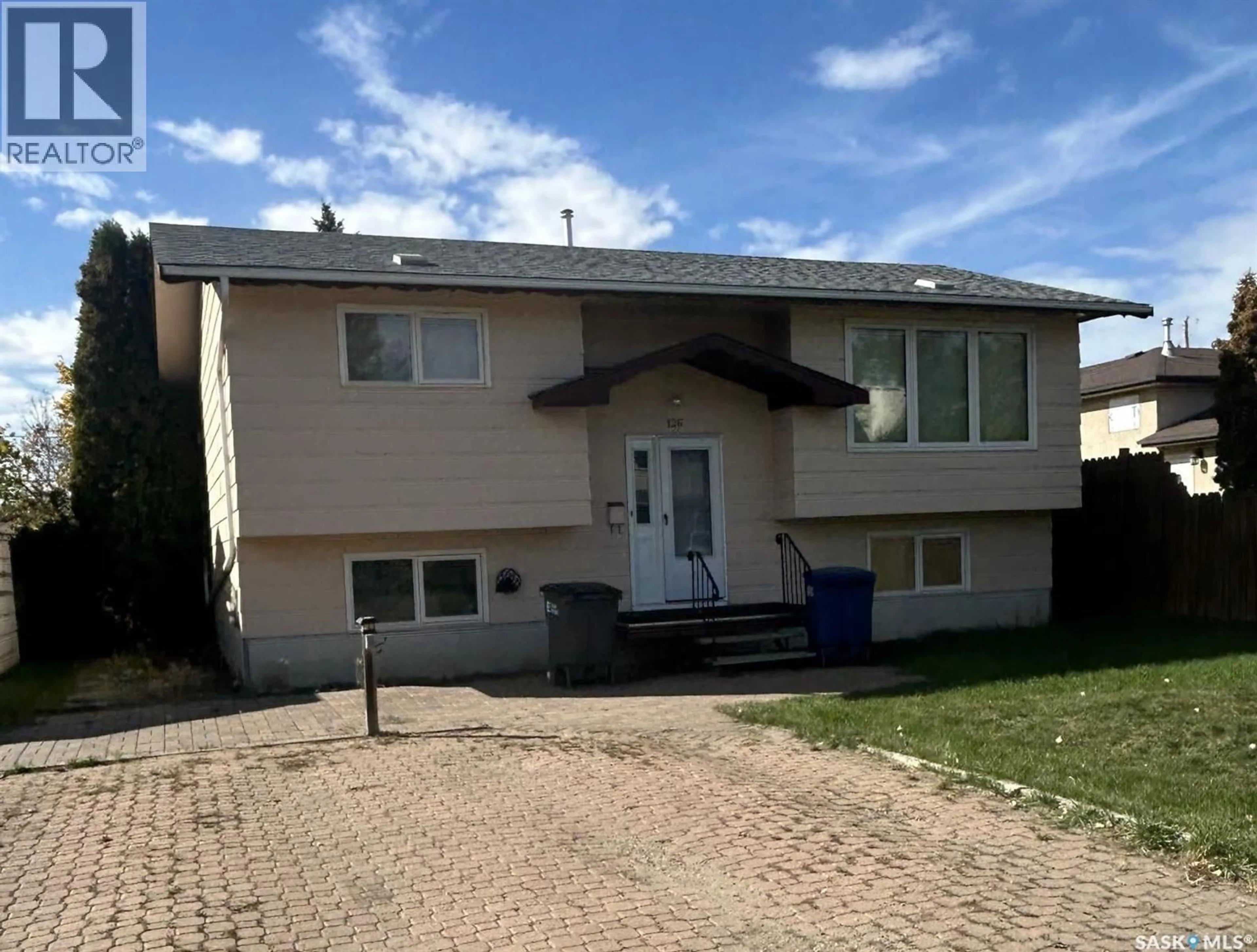 Home with vinyl exterior material, street for 126 BURTON STREET, Grand Coulee Saskatchewan S4M0A3