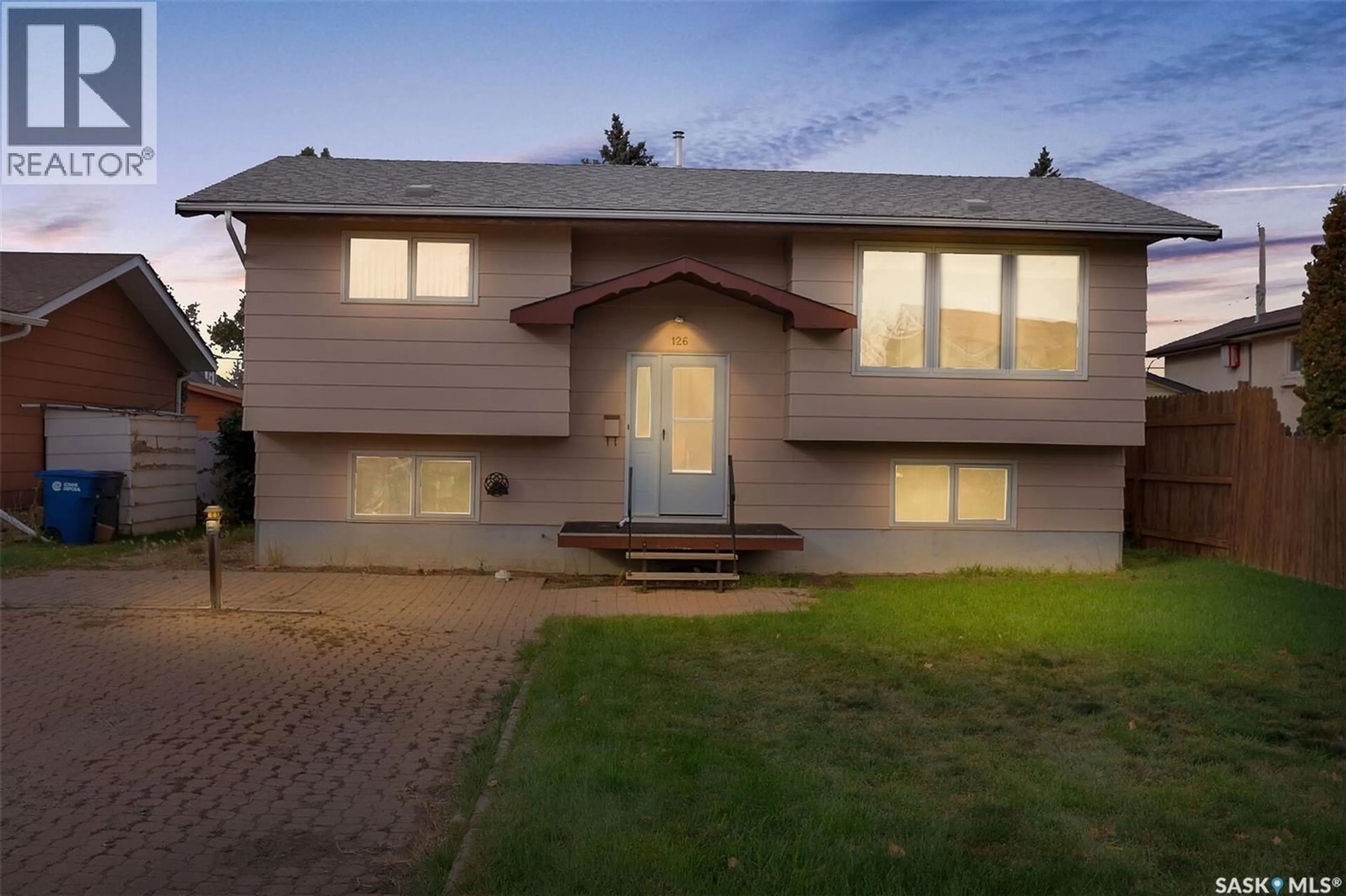 Home with vinyl exterior material, street for 126 BURTON STREET, Grand Coulee Saskatchewan S4M0A3