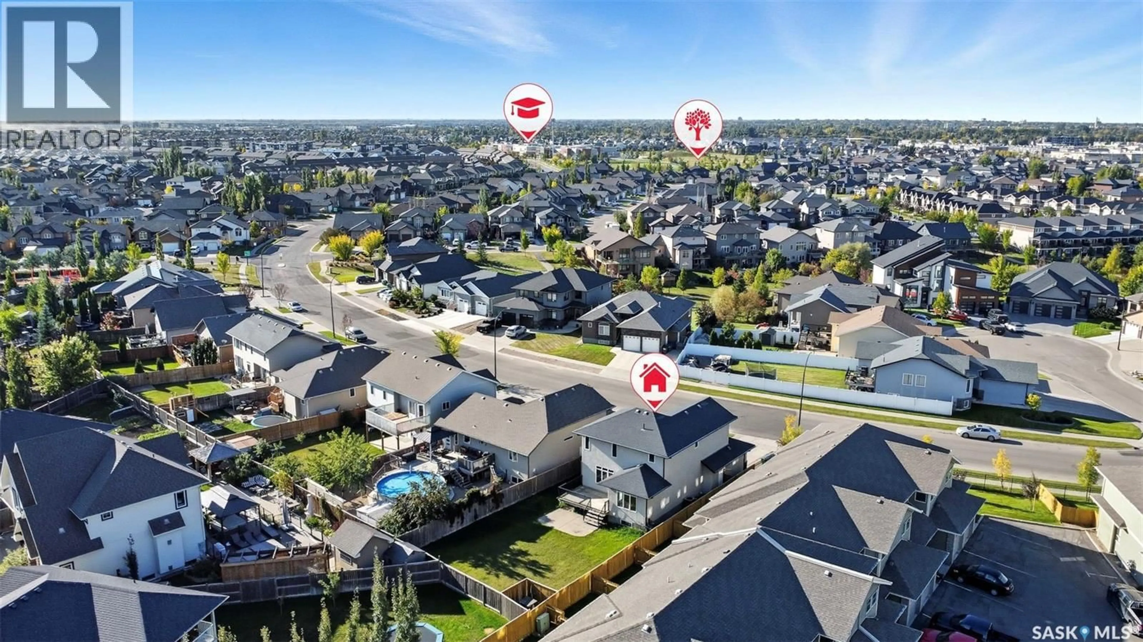 A pic from outside/outdoor area/front of a property/back of a property/a pic from drone, street for 1346 STENSRUD ROAD, Saskatoon Saskatchewan S7W0B9