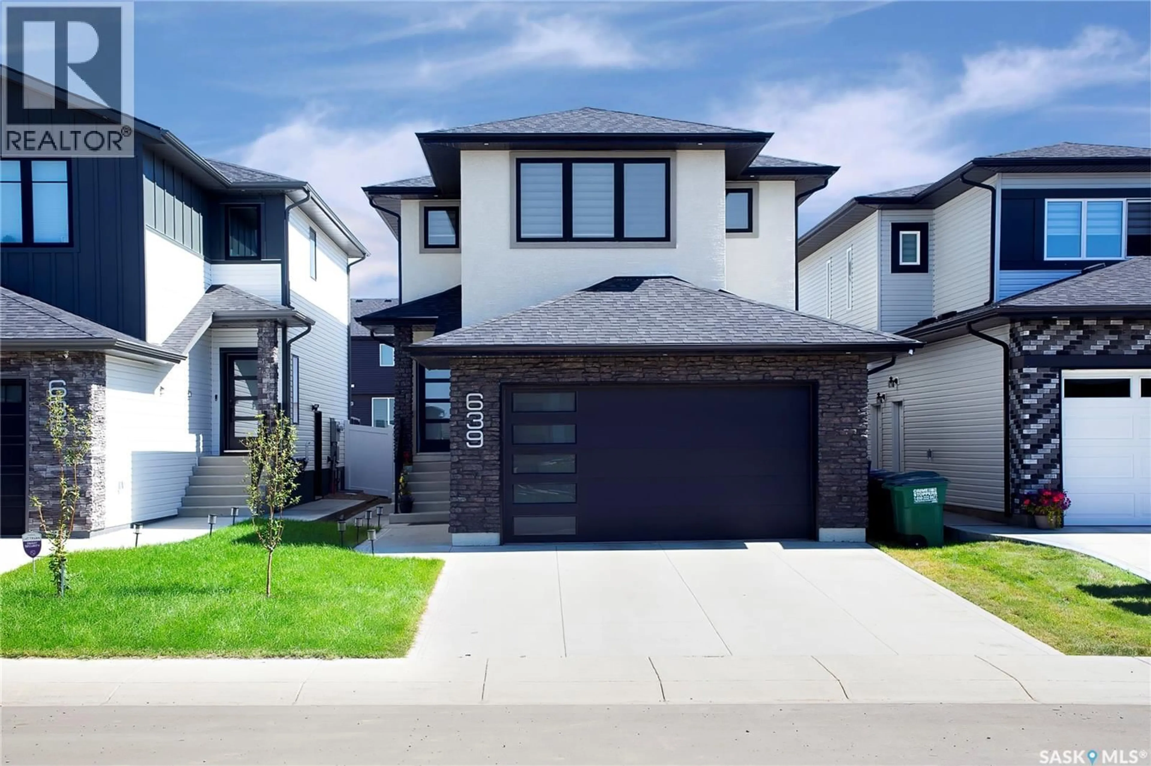 Home with brick exterior material, street for 639 UNDERHILL ROAD, Saskatoon Saskatchewan S7V1N8