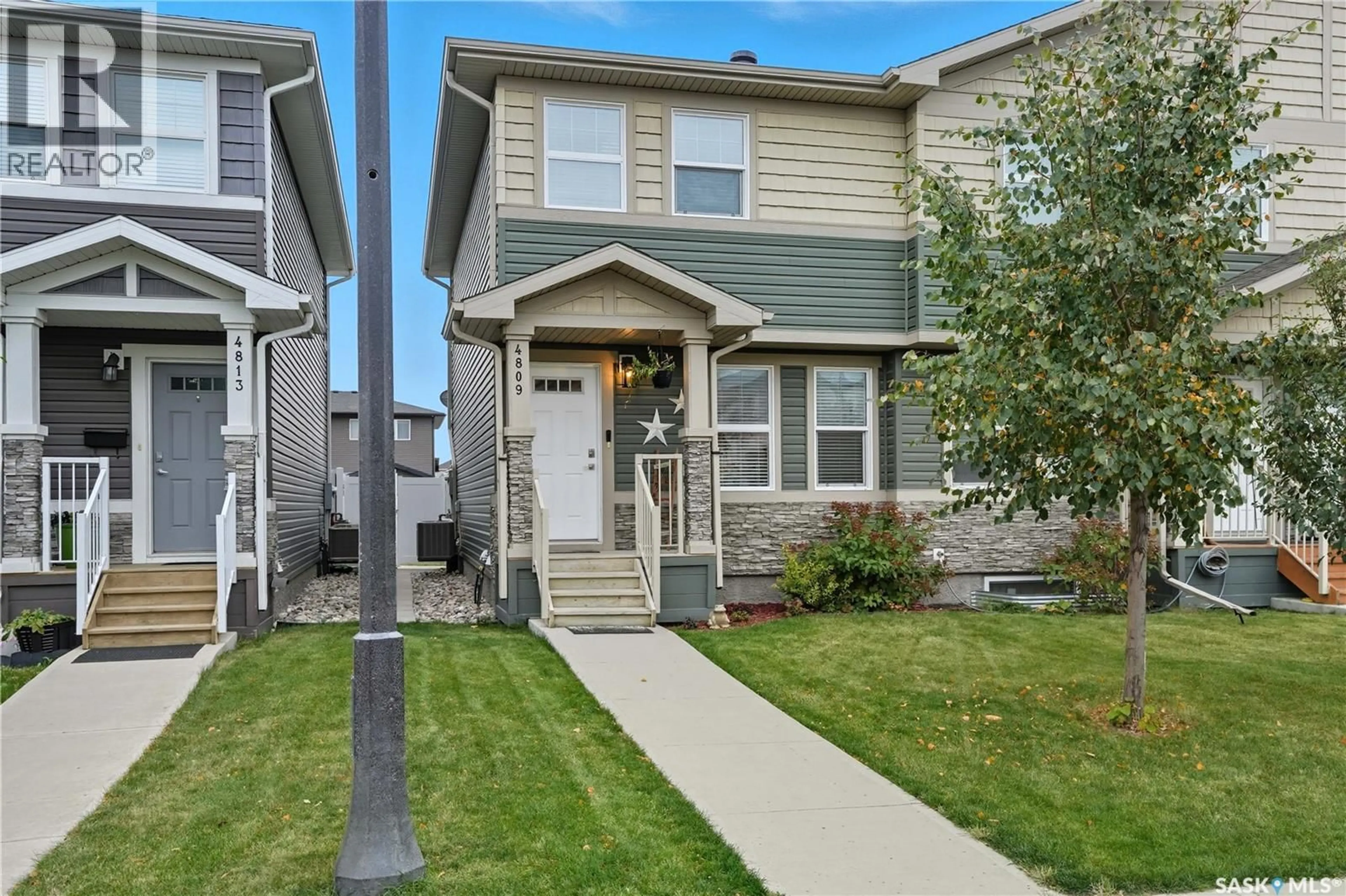 Home with vinyl exterior material, street for 4809 PRIMROSE GREEN DRIVE, Regina Saskatchewan S4V3L1